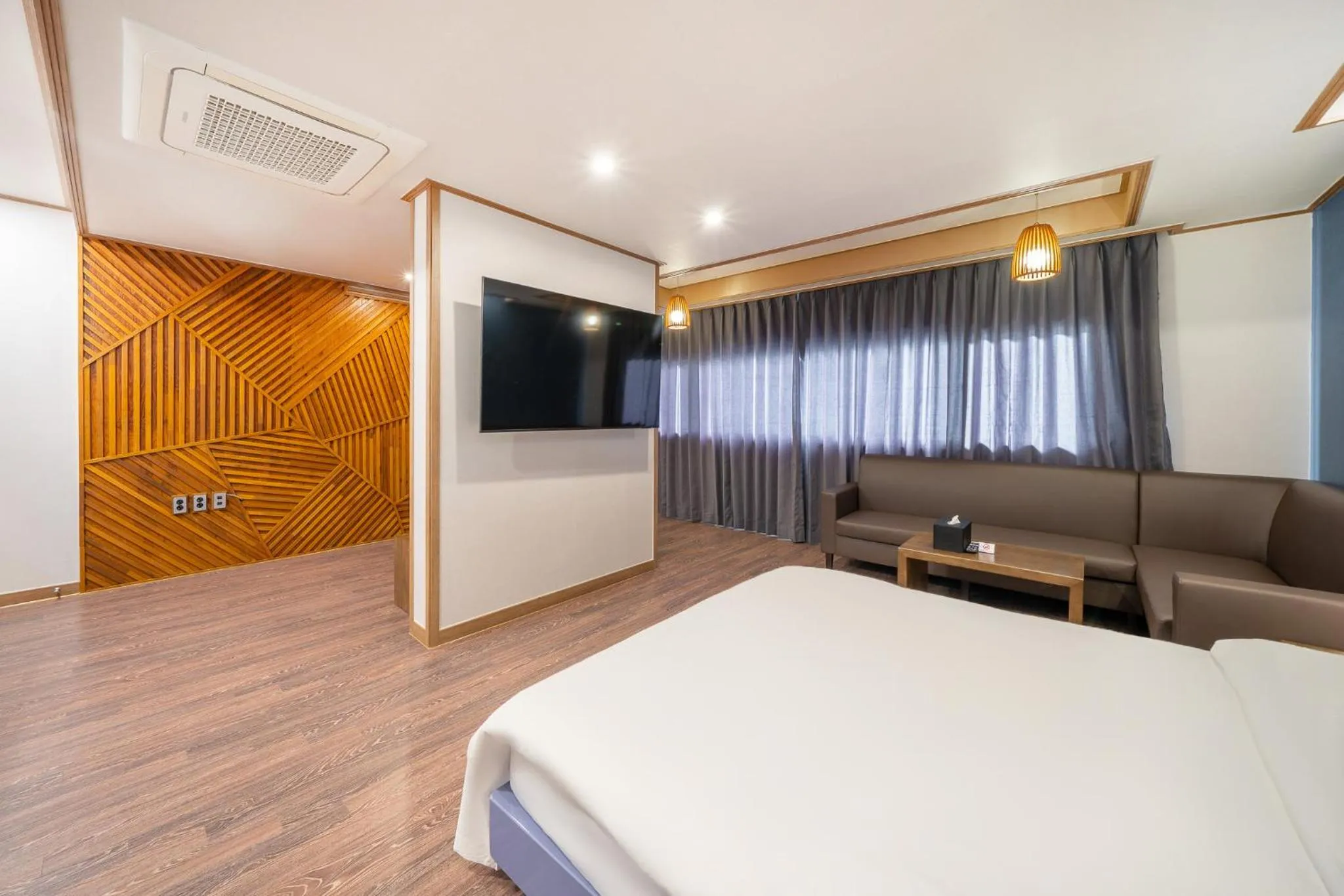 Bed in The 7 Business Hotel