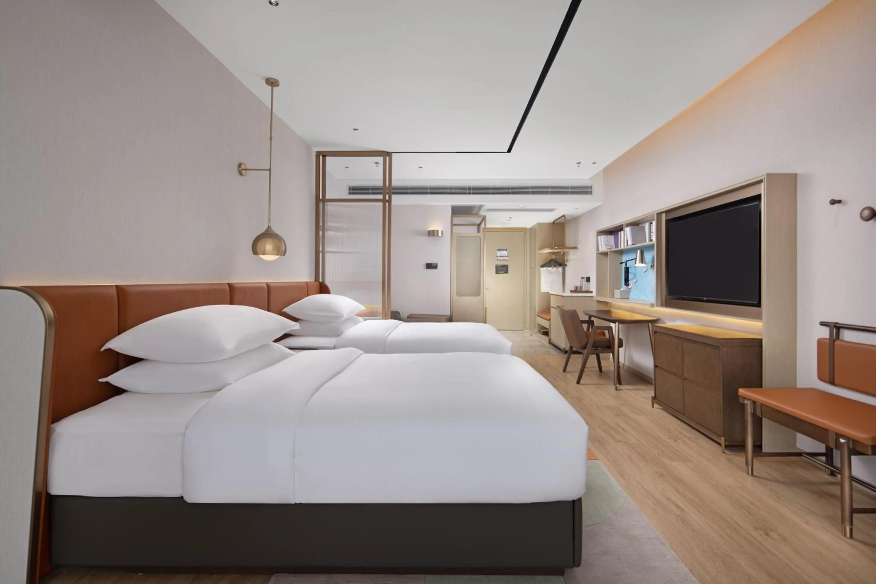 Bed in Home2 Suites by Hilton Nanning