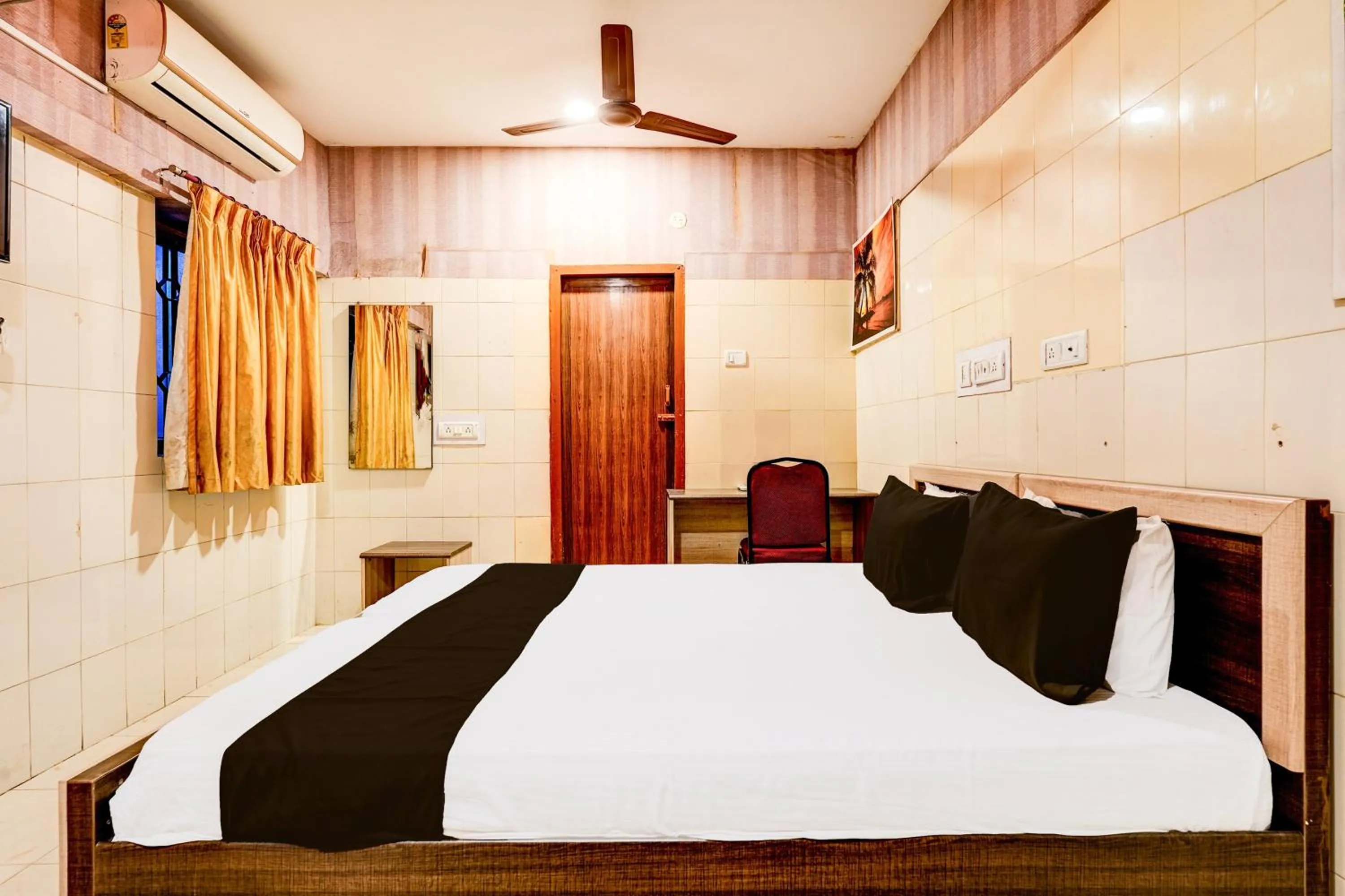 Bedroom in Hotel O MIZPAH INN