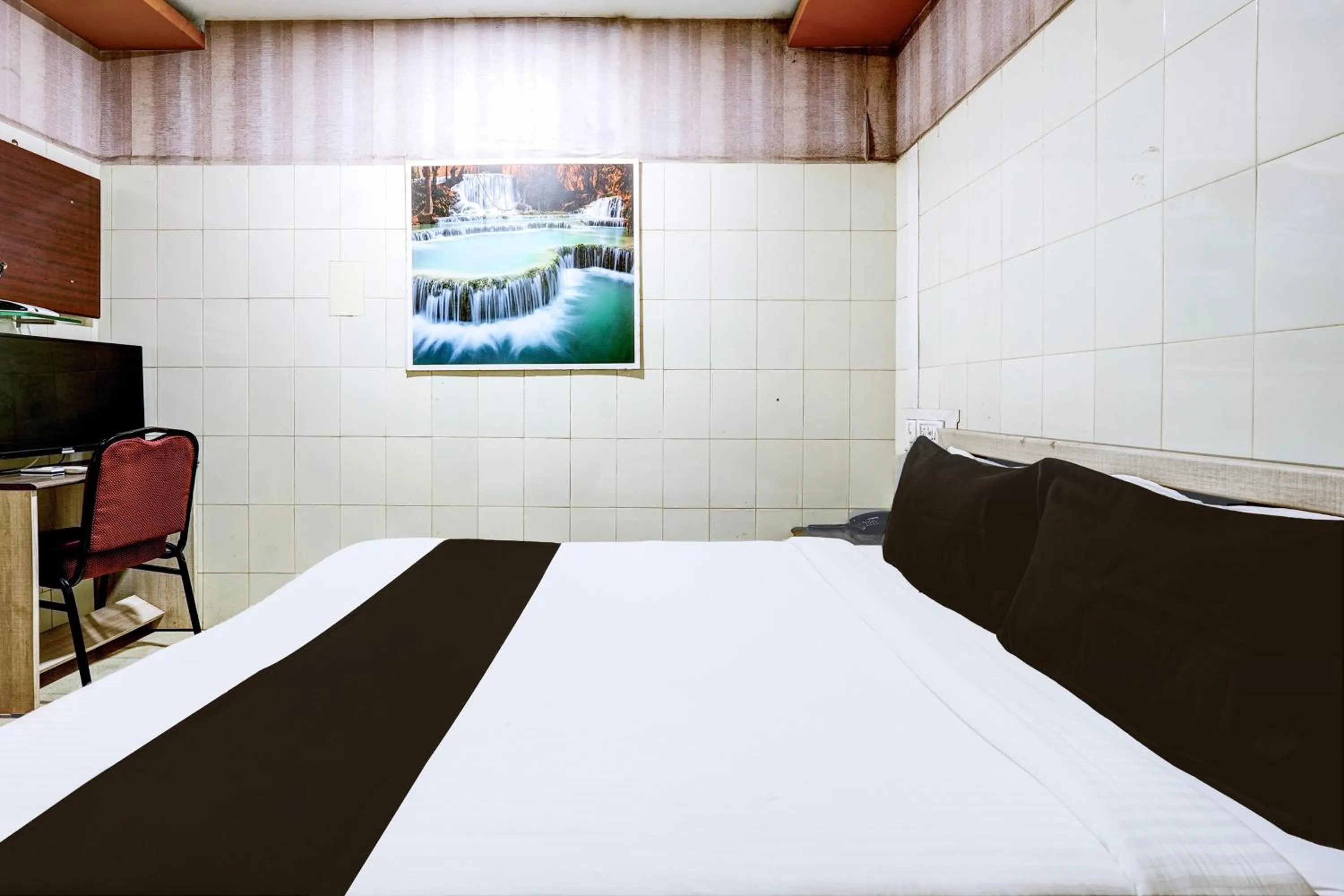 Bedroom in Hotel O MIZPAH INN