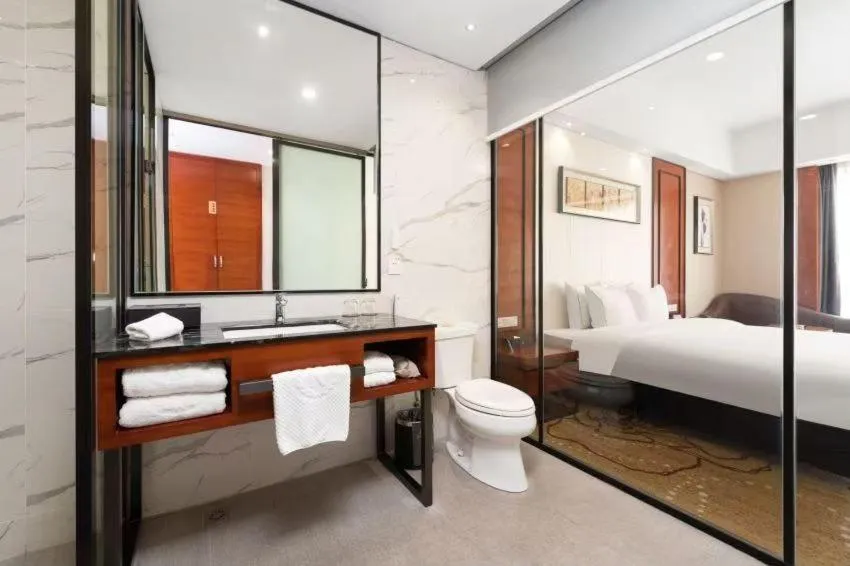 Bed in 深圳国际会展中心凯嘉酒店-Shenzhen Kaijia Hotel-Shenzhen-World