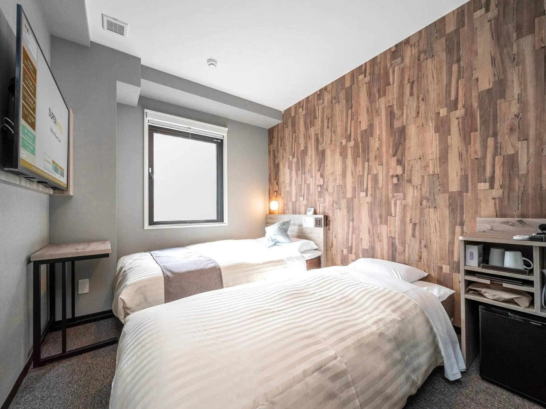 Bed in Super Hotel Premier Namba Shinsaibashi Natural Hot Spring