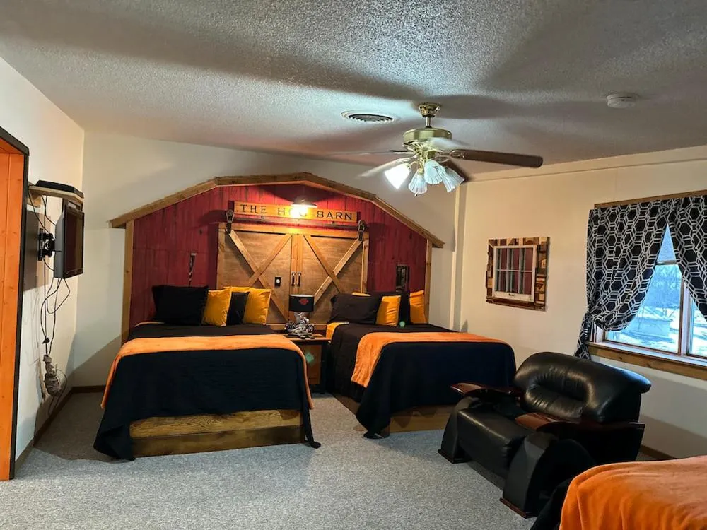 Bed in Country Cabins Hotel