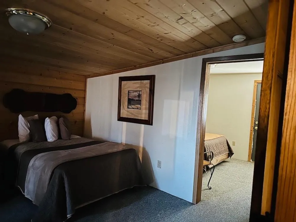 Bed in Country Cabins Hotel