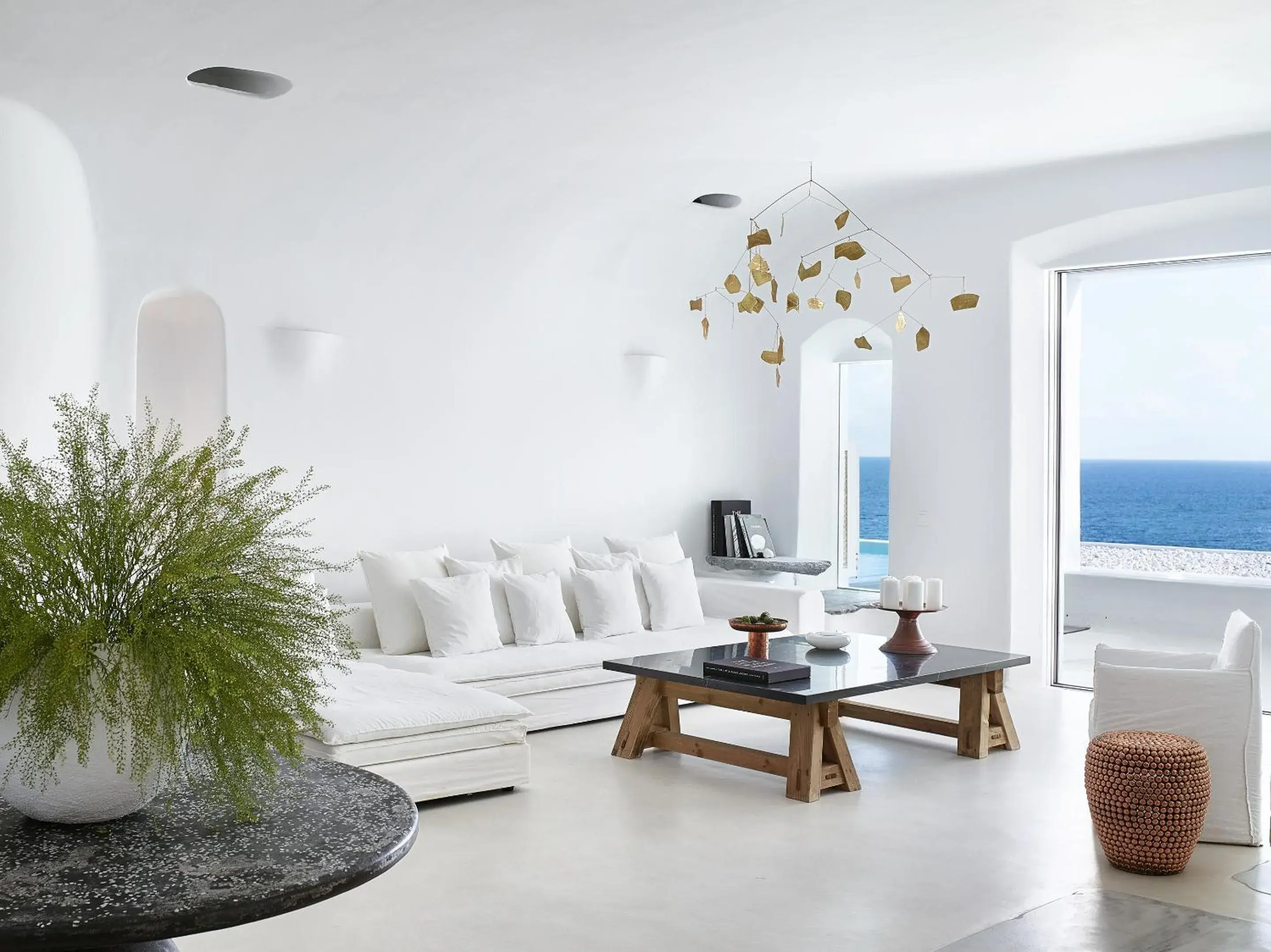 Living room in Mykonos Blu, A Grecotel Resort to Live Living room in Mykonos Blu, A Grecotel Resort to Live