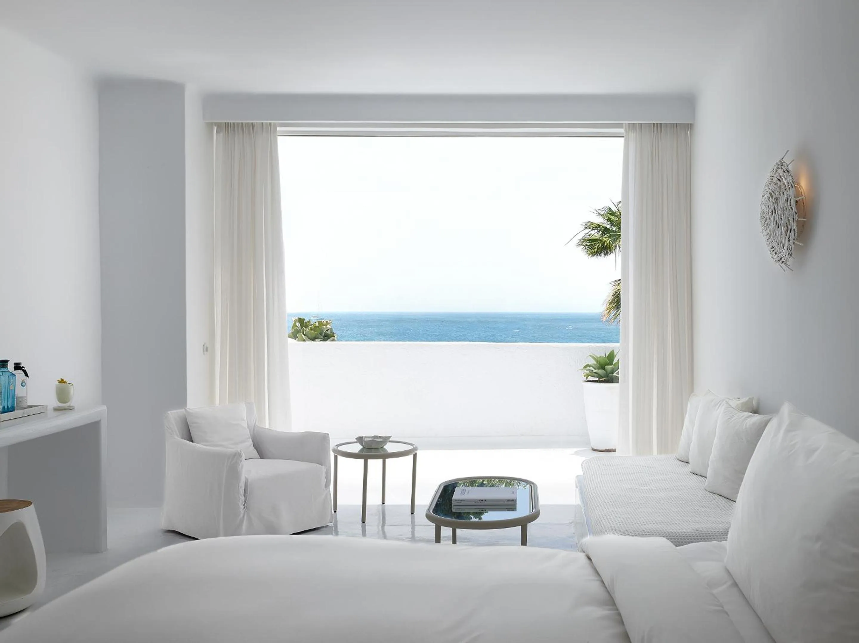 Seating area, Bed in Mykonos Blu, A Grecotel Resort to Live