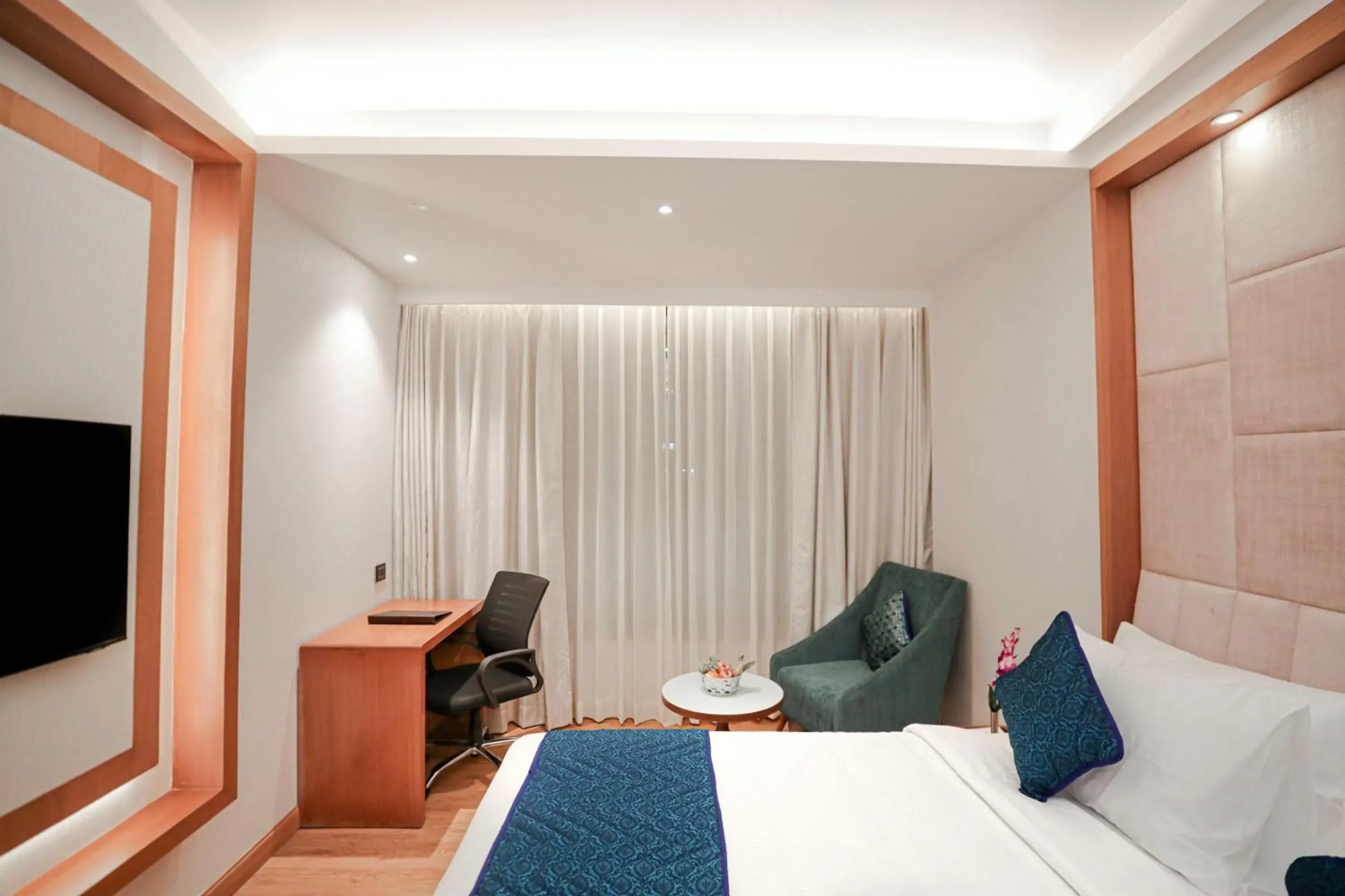 Bedroom, Bed in Regenta Place Bhopal by Royal Orchid Hotels Limited Bedroom, Bed in Regenta Place Bhopal by Royal Orchid Hotels Limited