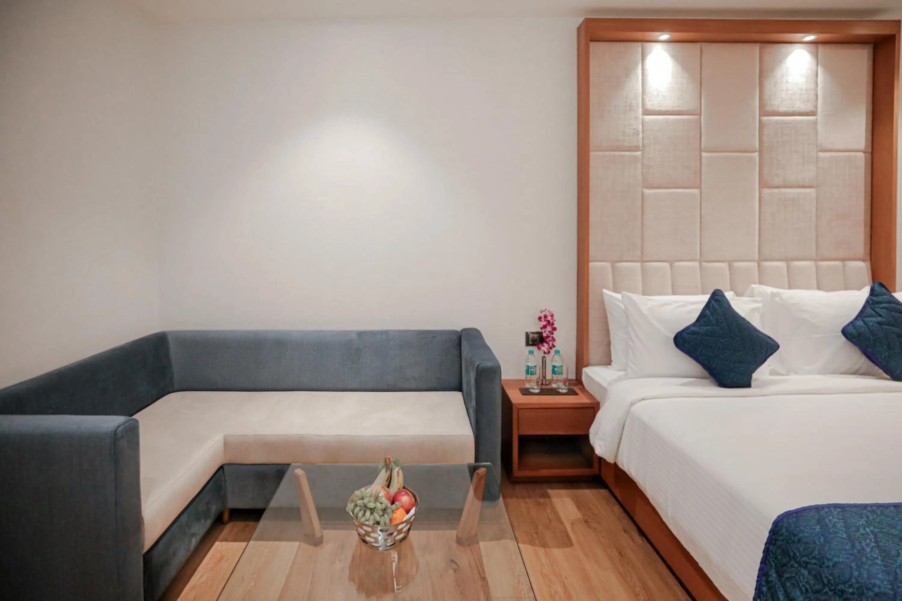 Seating area, Bed in Regenta Place Bhopal by Royal Orchid Hotels Limited