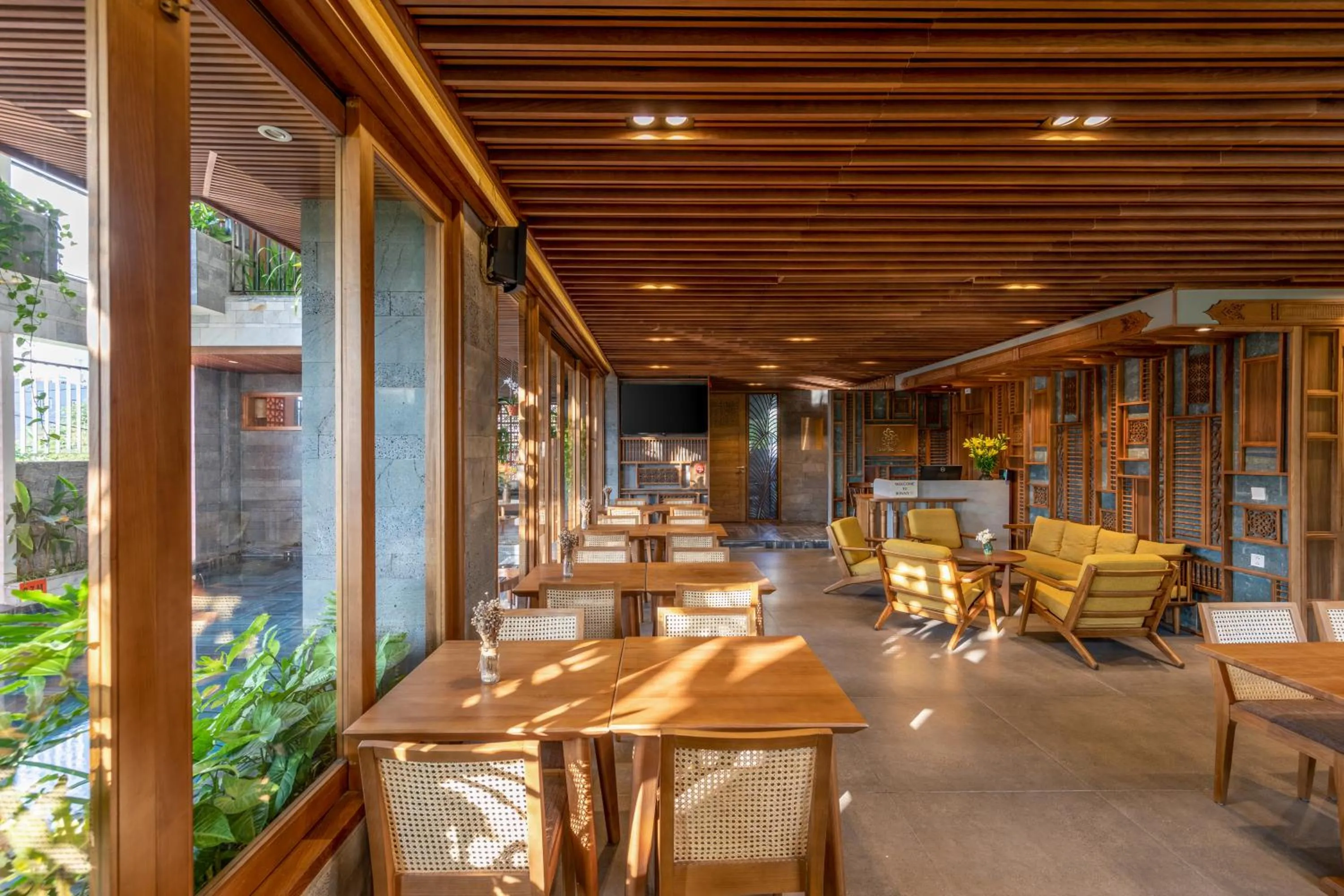 Communal lounge/ TV room in Bonny Boutique Hotel Da Nang