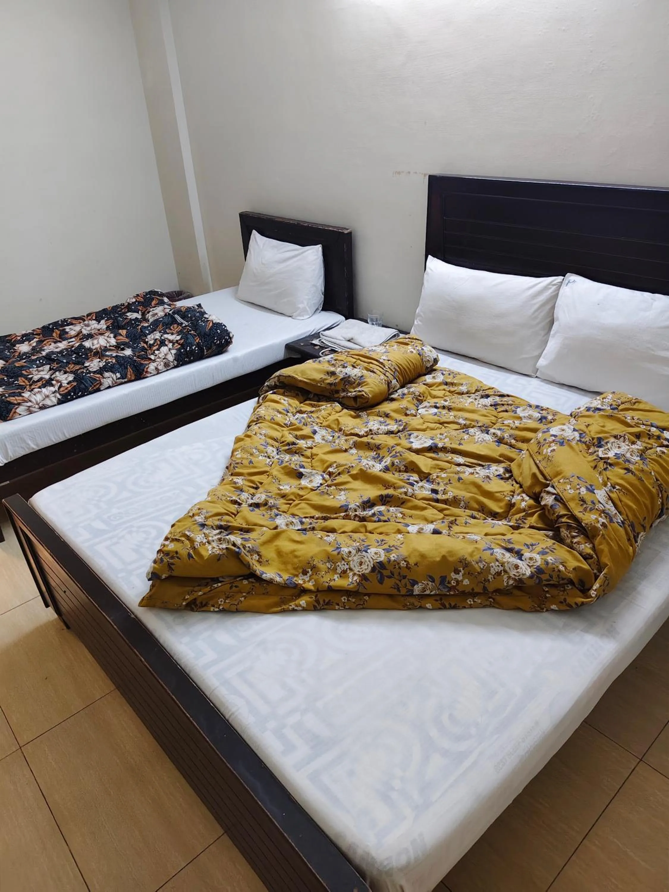 Bed in Al Sakhawat Hotel