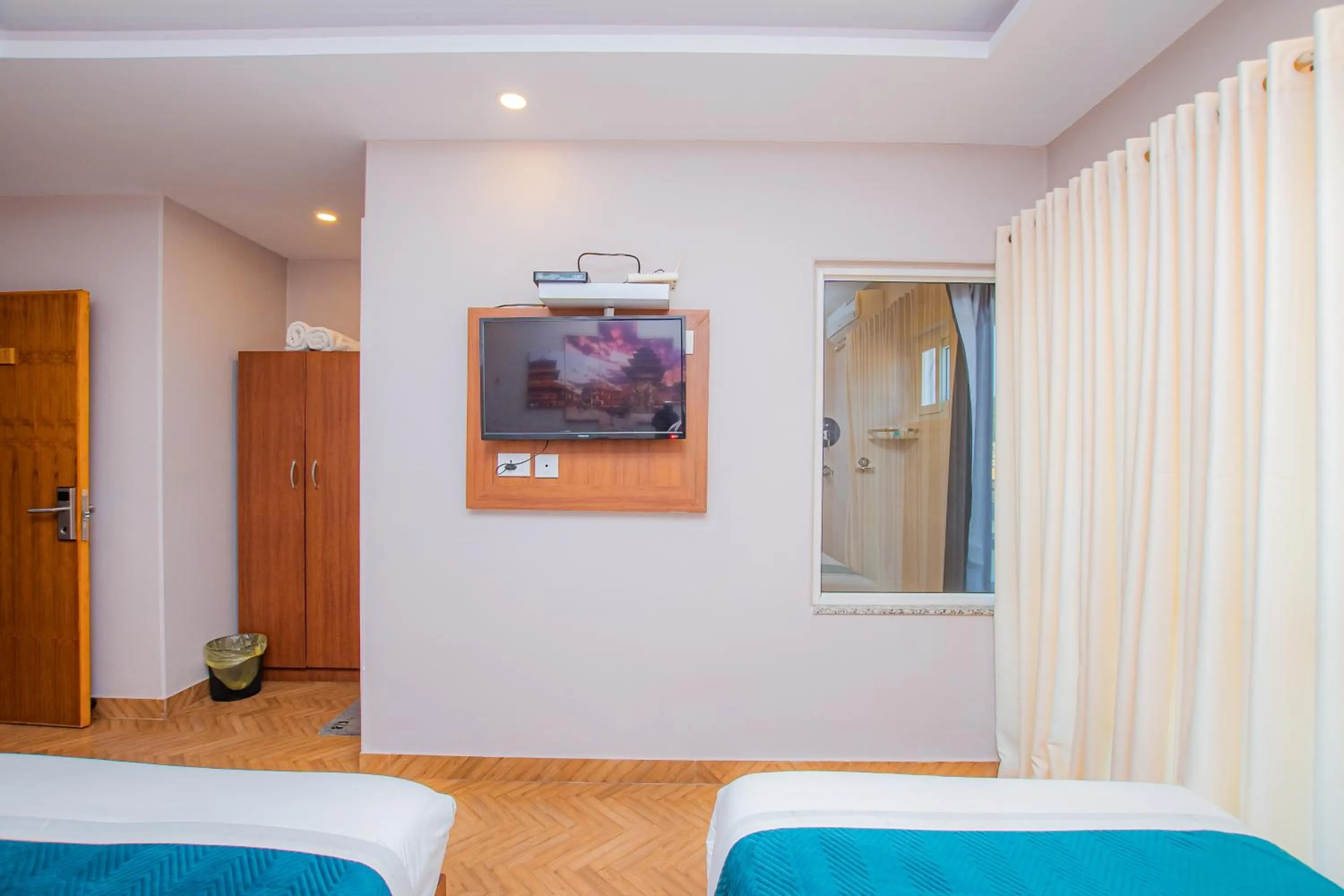 Bed in Majheri Resort and Spa