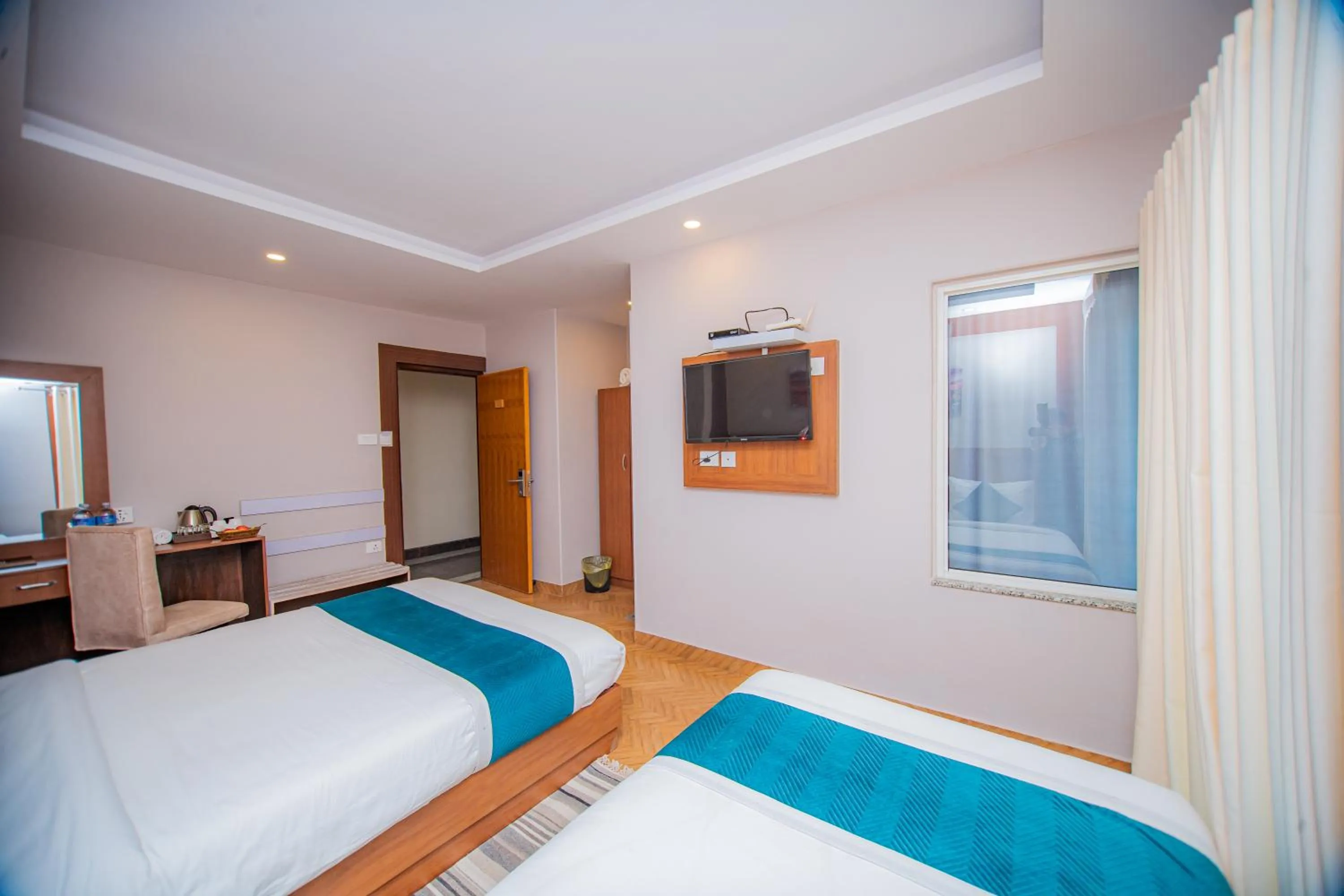 Bed in Majheri Resort and Spa