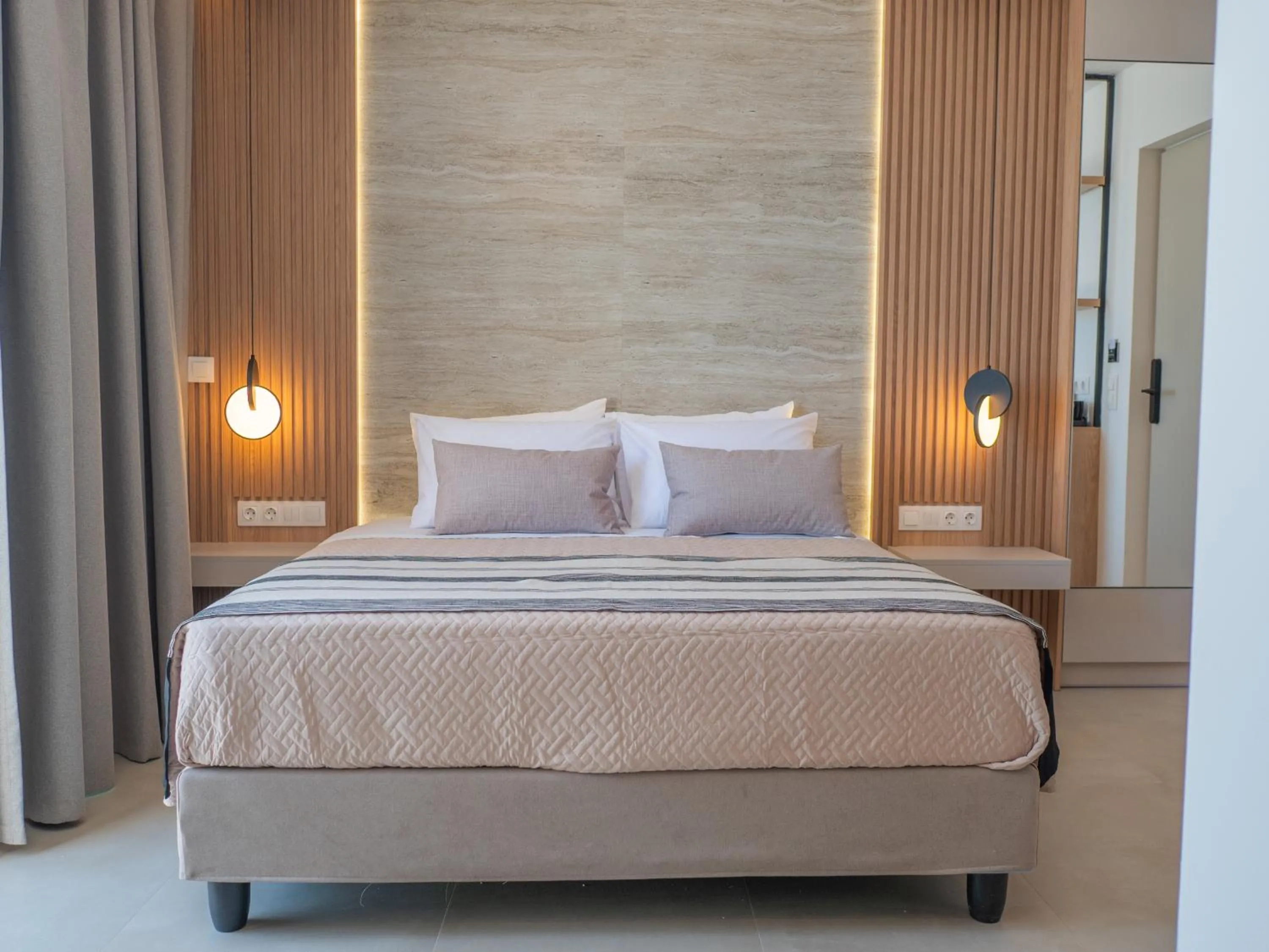 Bed in Poseidon Hotel