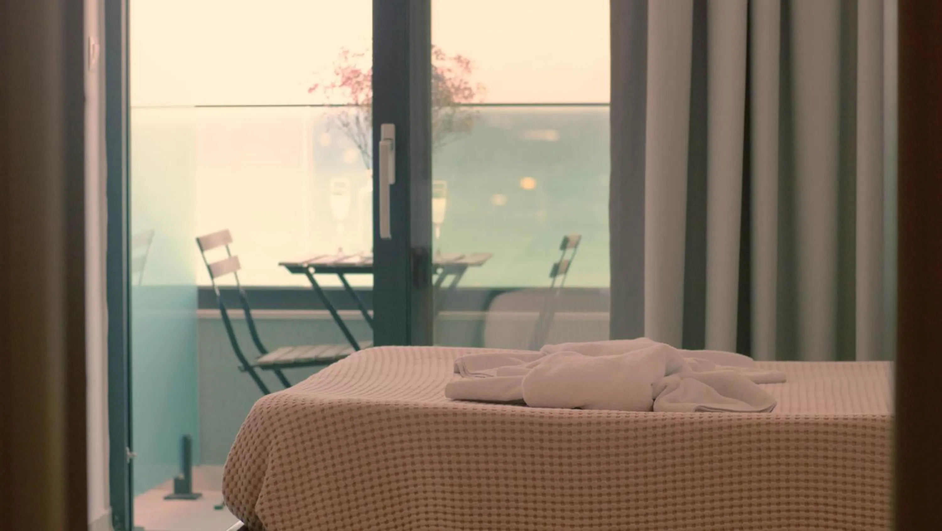 Bed in Poseidon Hotel