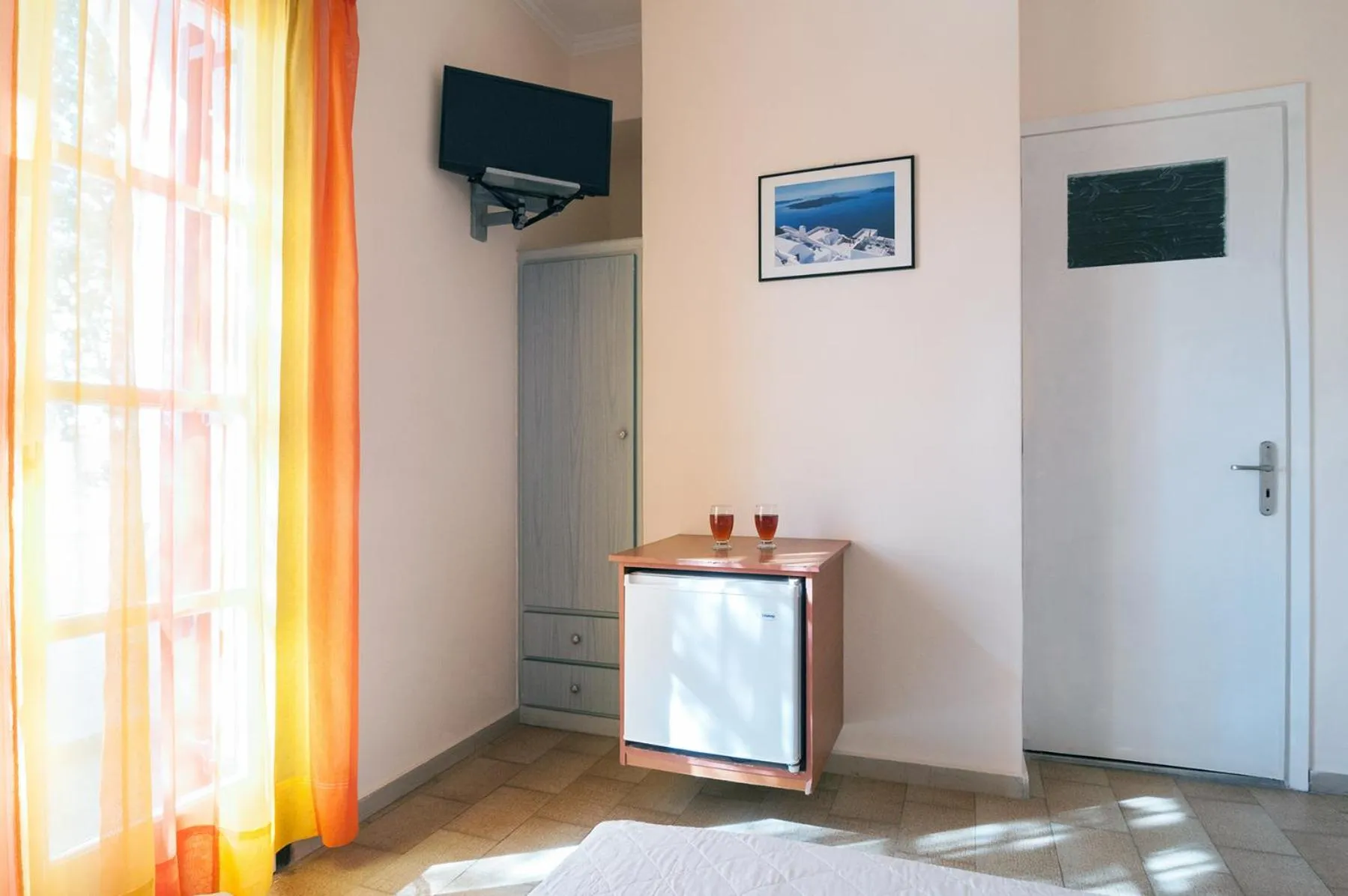 TV and multimedia in Holiday Beach Resort Santorini