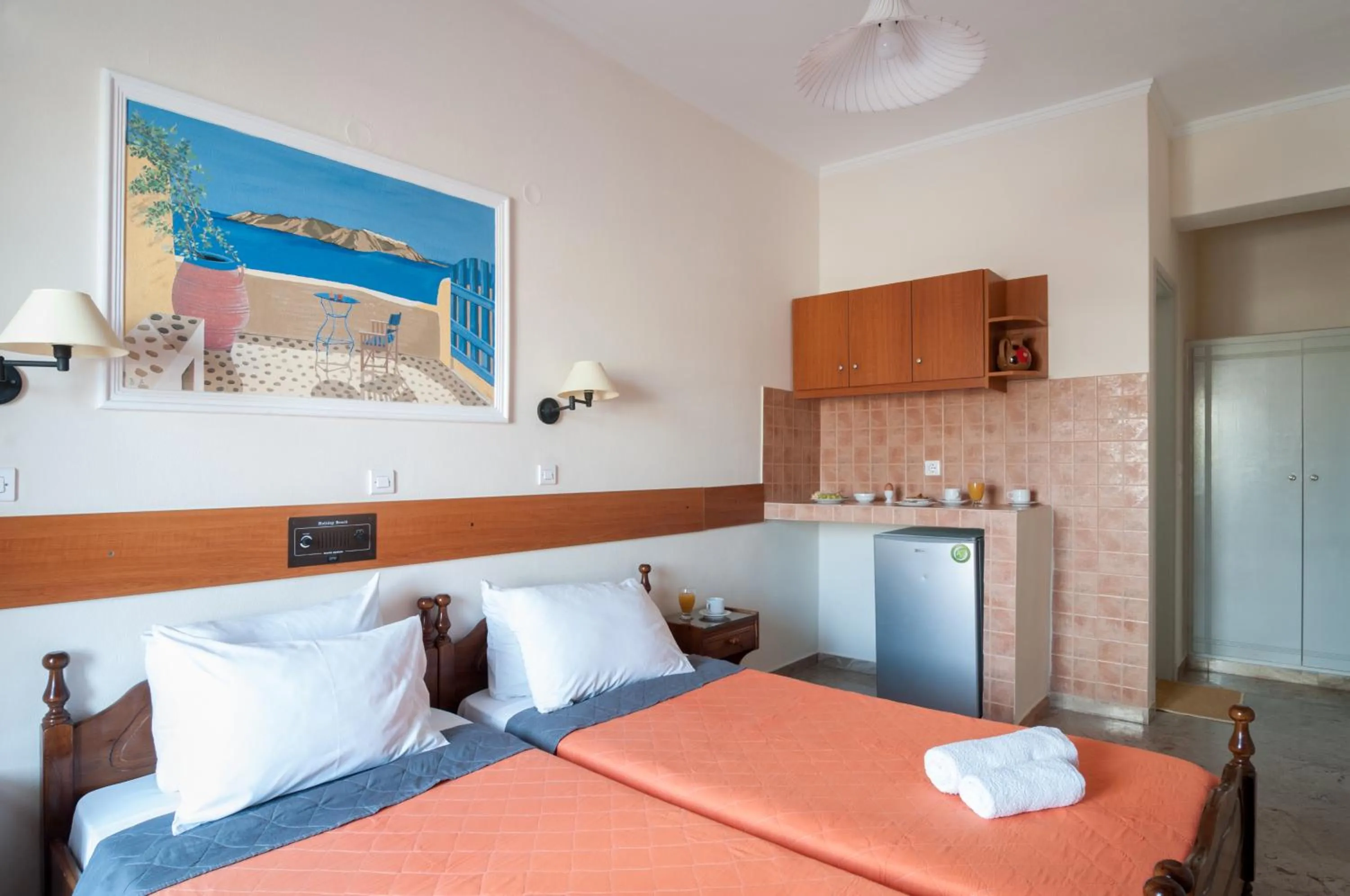 Bed in Holiday Beach Resort Santorini