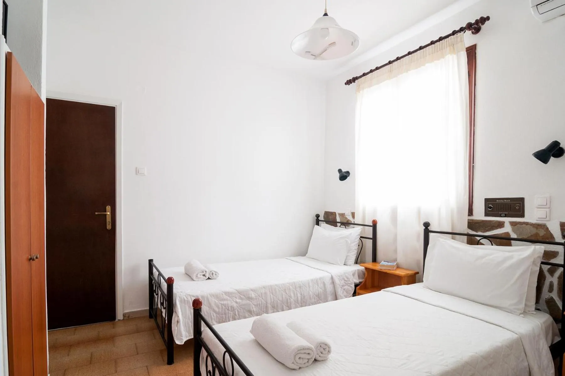 Bed in Holiday Beach Resort Santorini