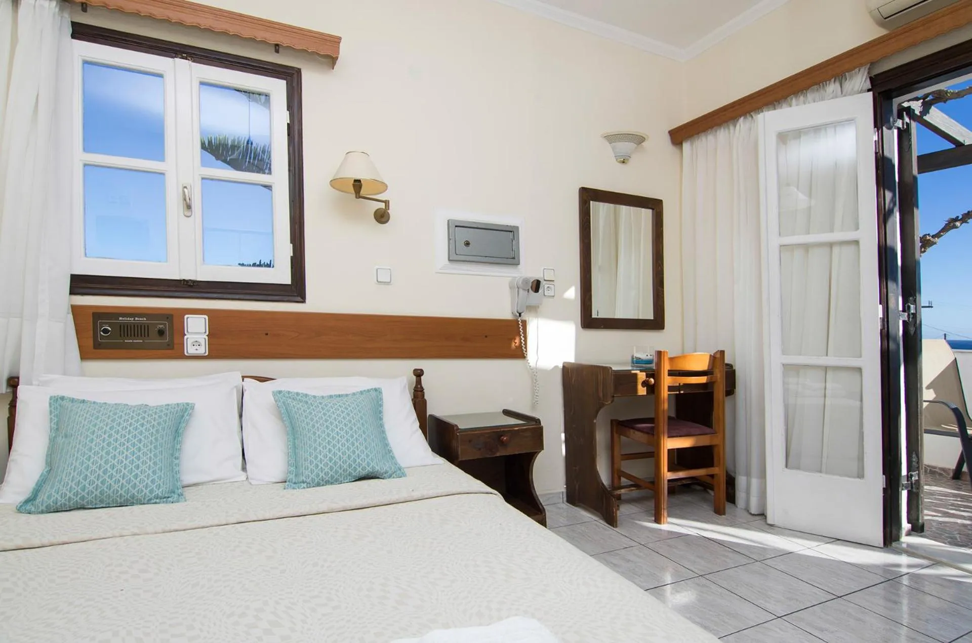 Pool view, Bed in Holiday Beach Resort Santorini