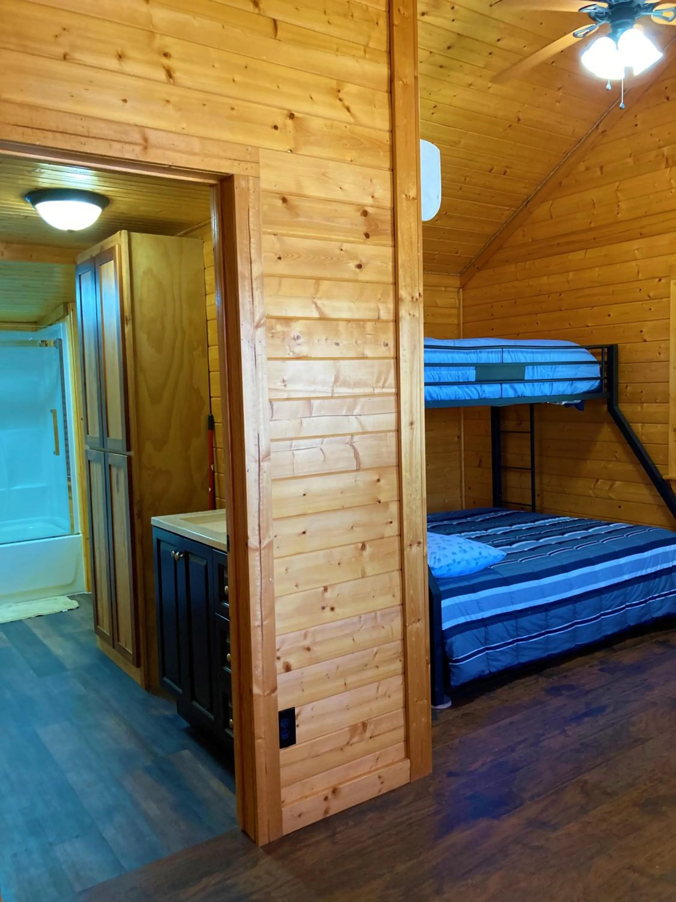 Photo of the whole room, Bed in Outback Campground and Marina