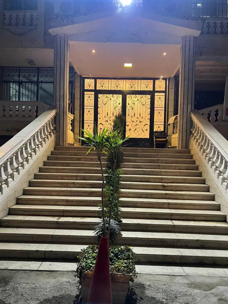 Facade/entrance in Asia Grand Museum & Pyramids view