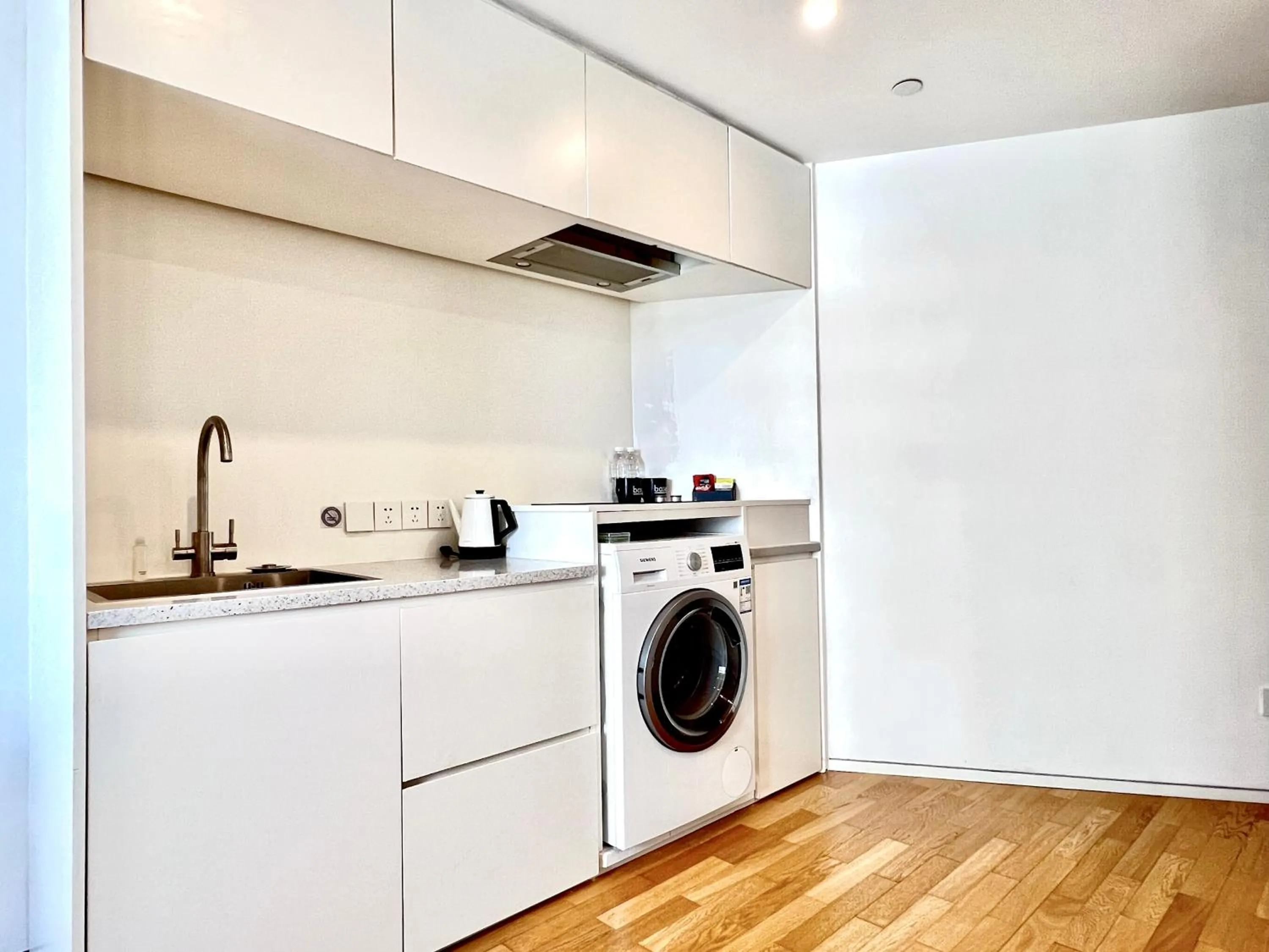 washing machine in base-Shanghai SUHE Serviced Apartment, Near East Nanjing Road & People's Square