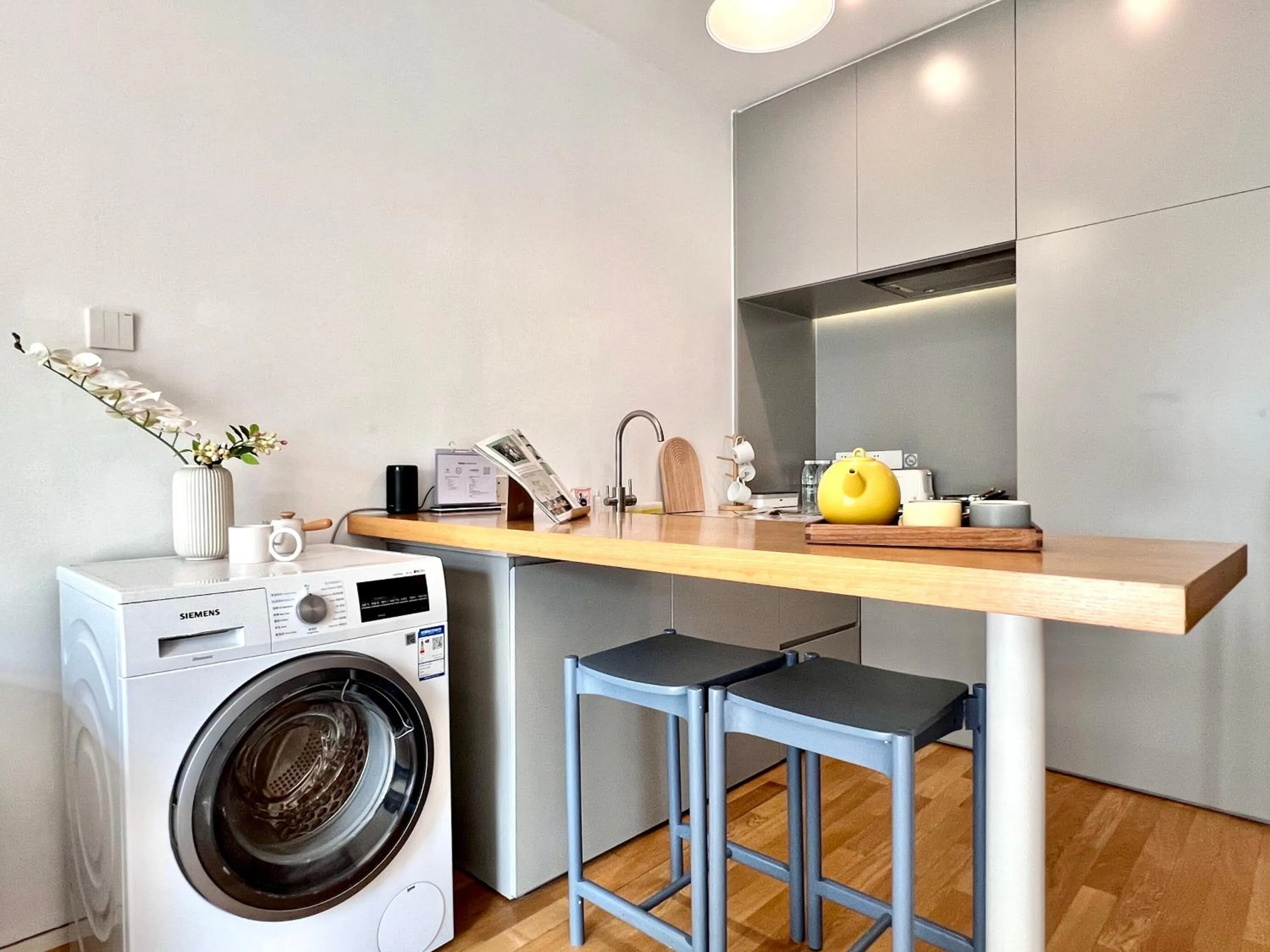 washing machine in base-Shanghai SUHE Serviced Apartment, Near East Nanjing Road & People's Square