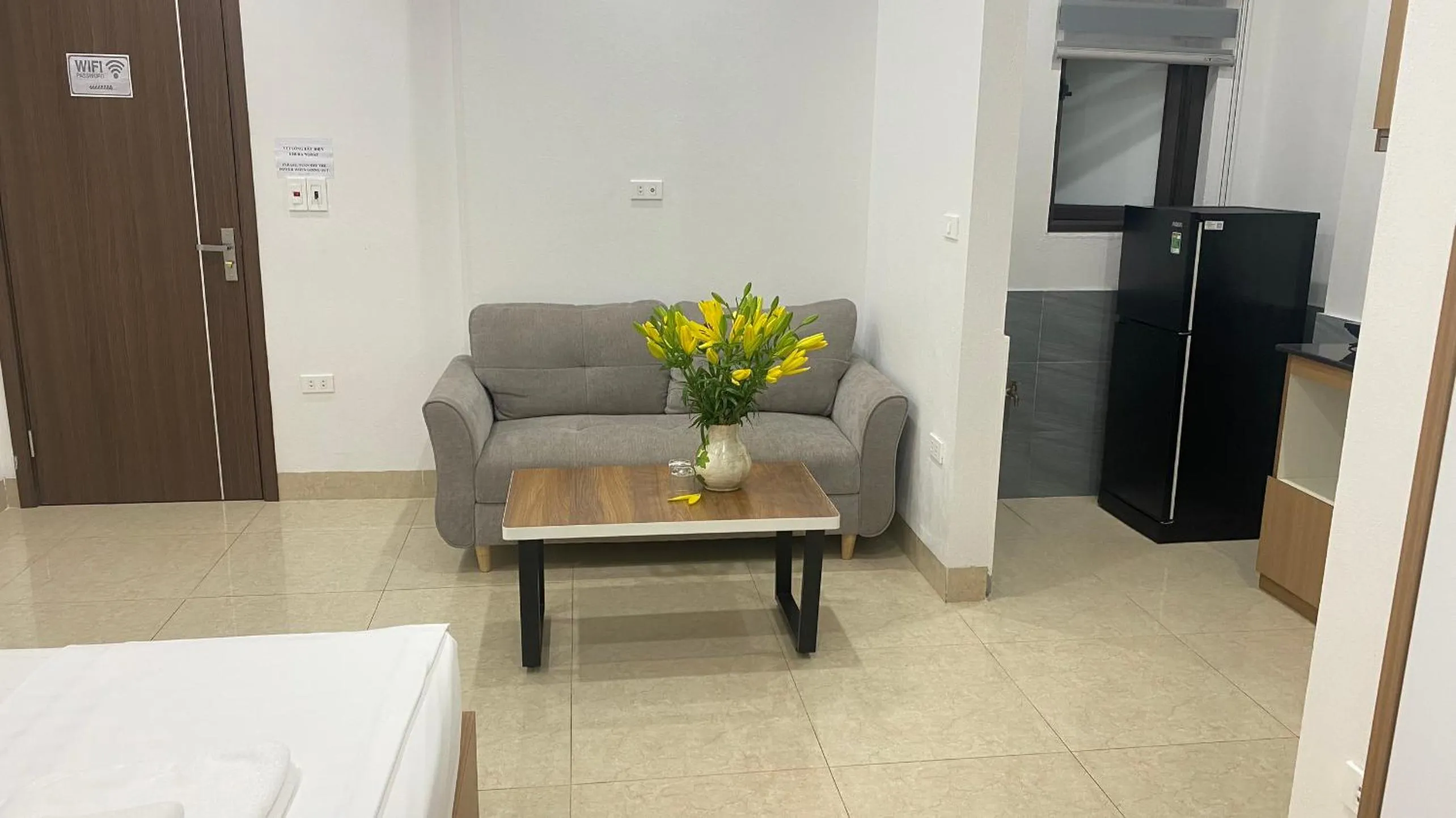 Seating area, Bed in Era Apartment Tran Thai Tong