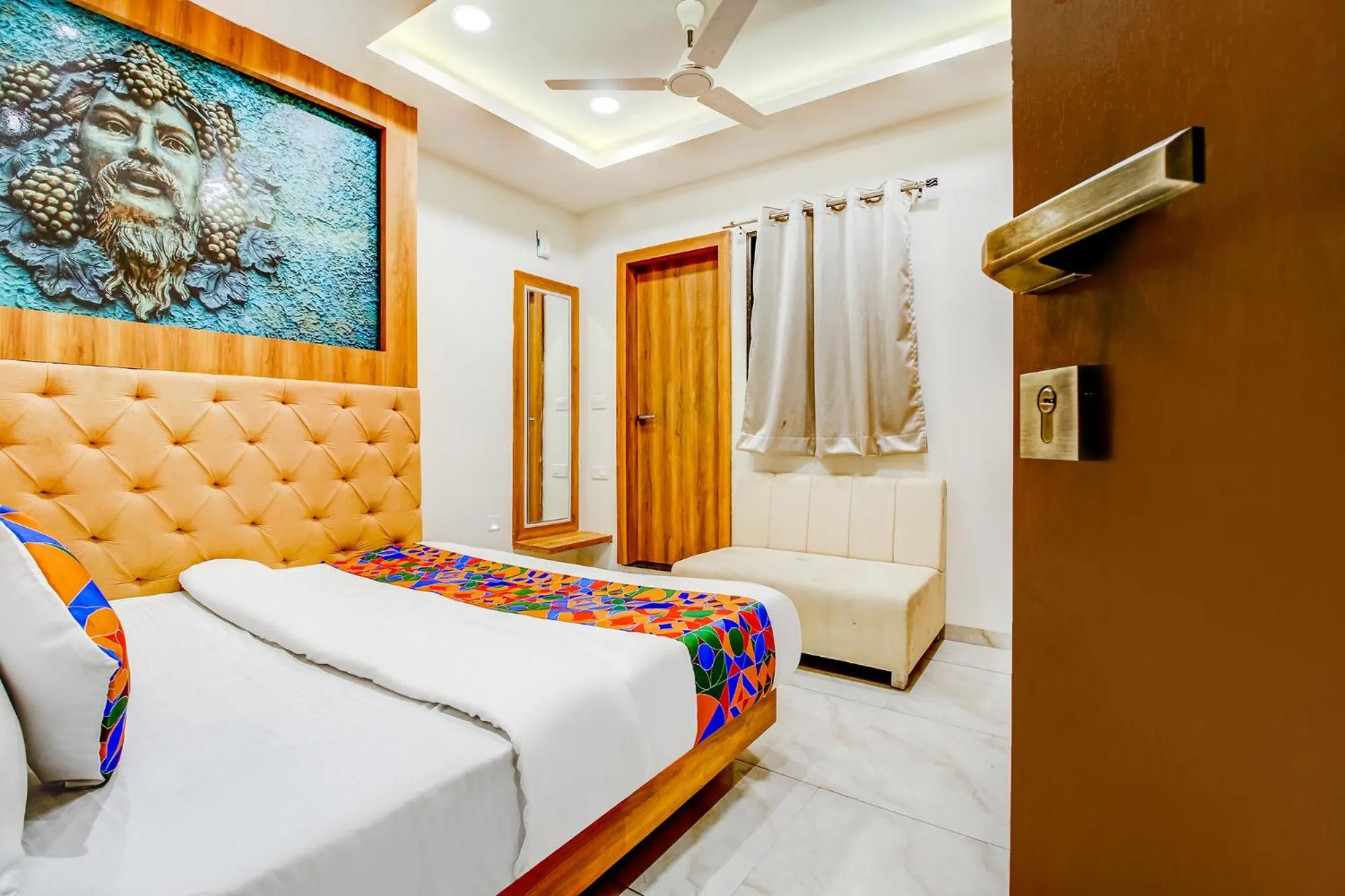 Bed in FabHotel Prime Purple Orchid