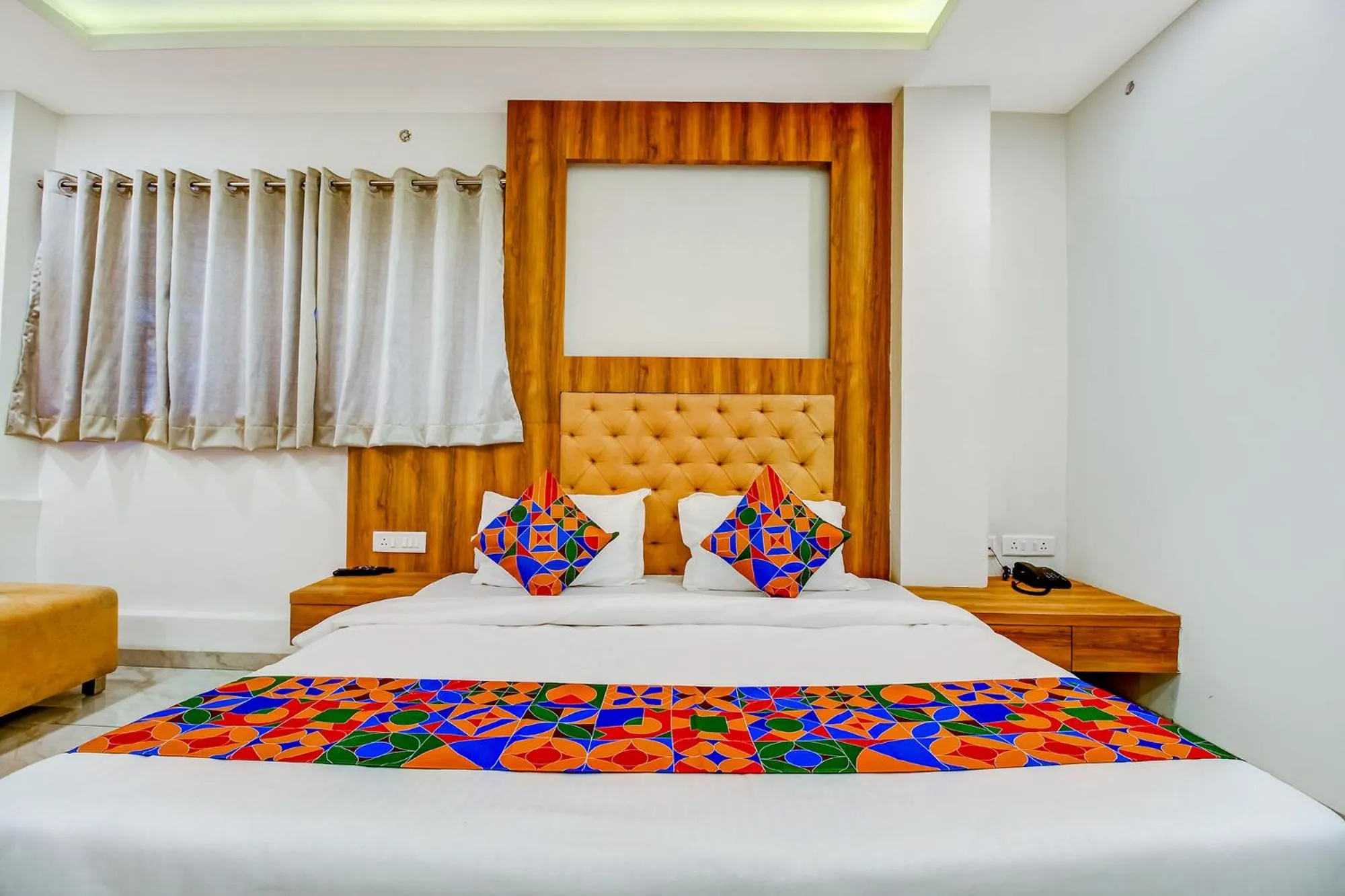 Bed in FabHotel Prime Purple Orchid