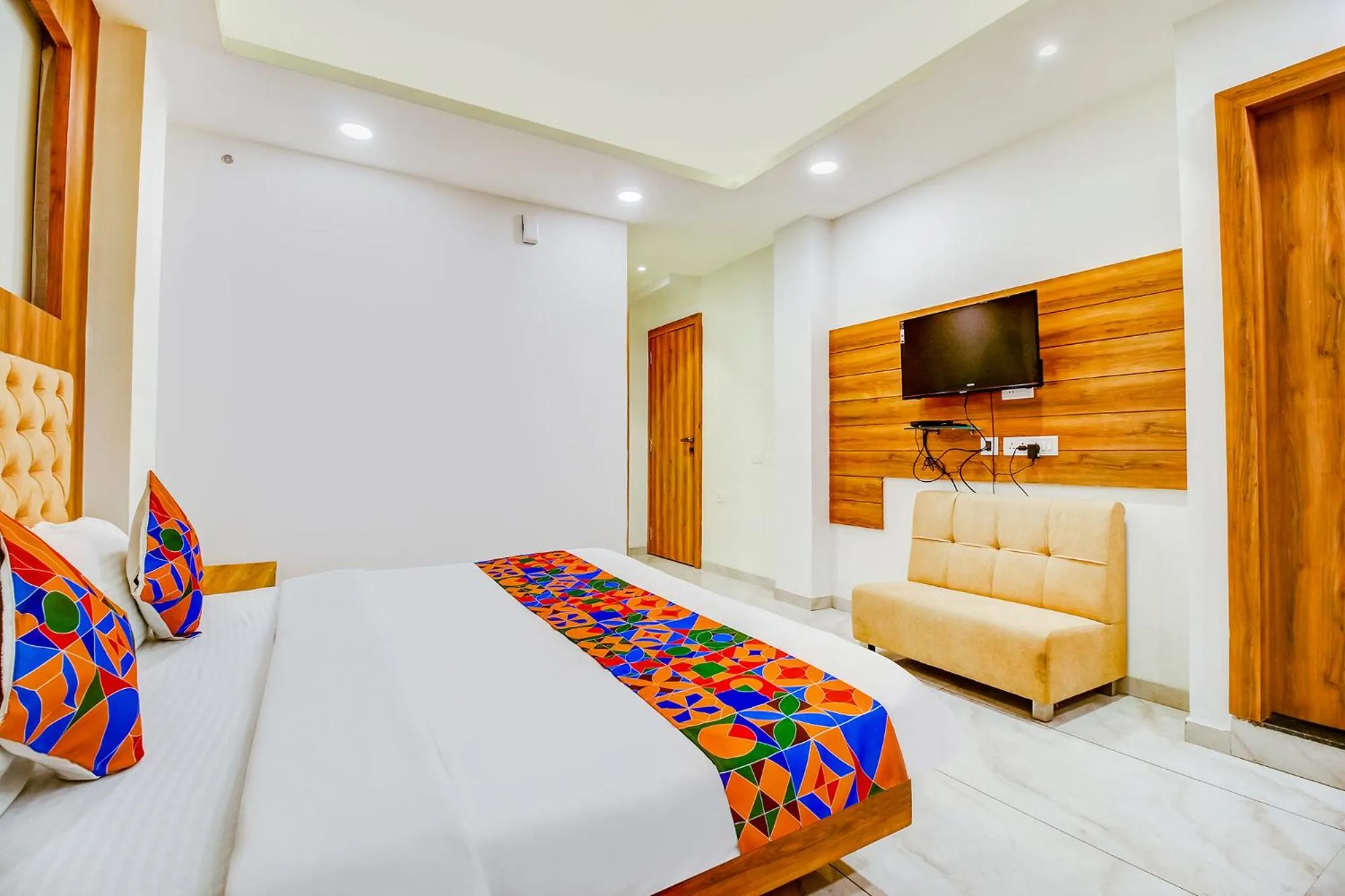 Bed in FabHotel Prime Purple Orchid