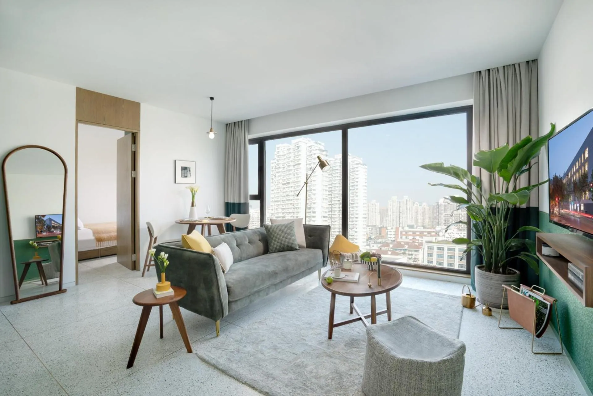 Living room in basePLUS-Shanghai BINJIANG Serviced Apartment