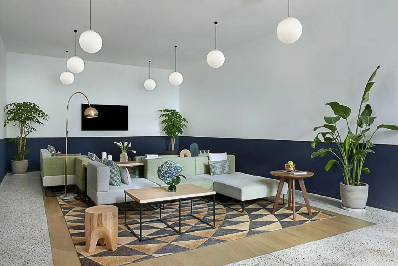 Communal lounge/ TV room in basePLUS-Shanghai BINJIANG Serviced Apartment