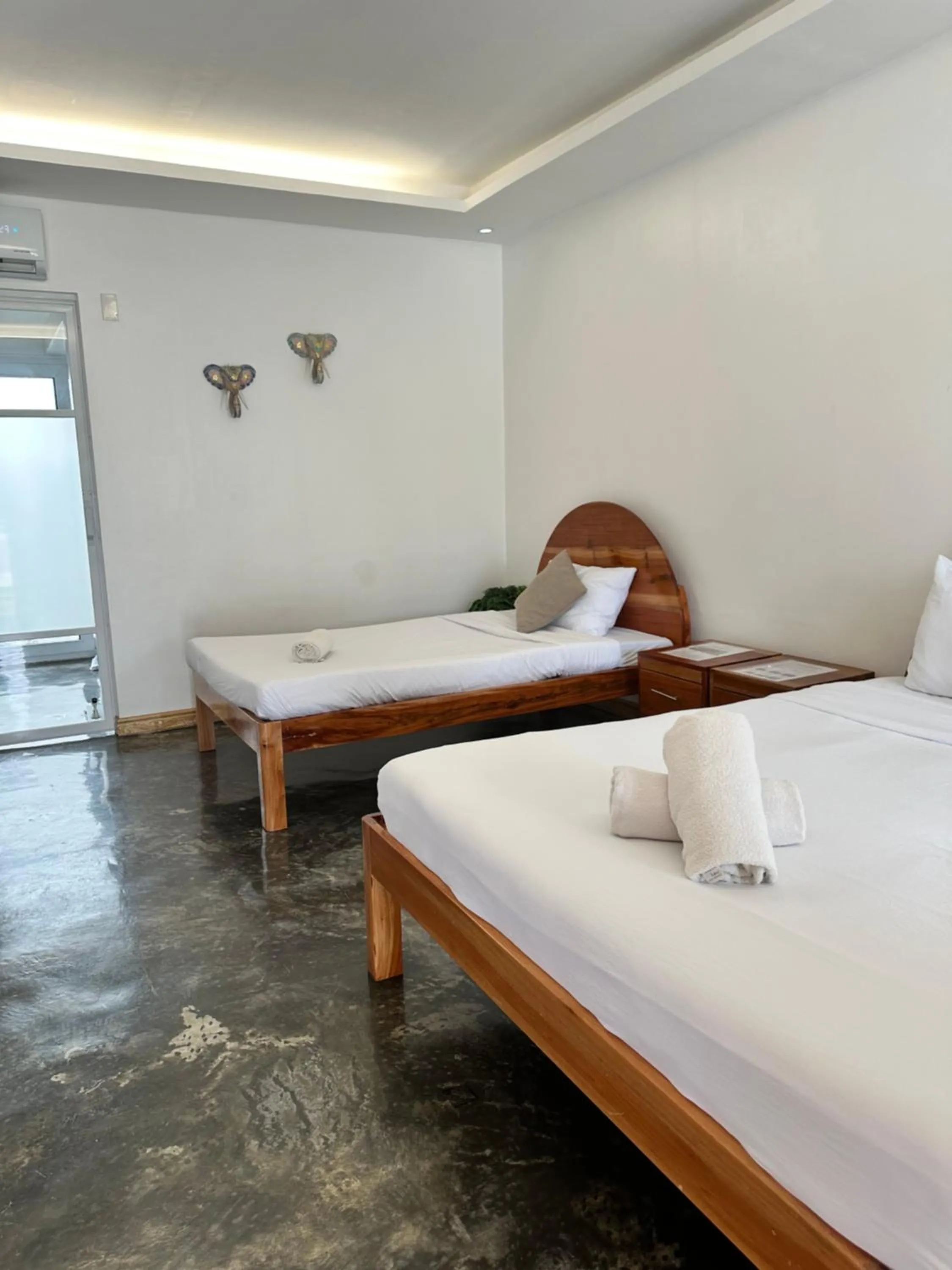 Bed in Treeshade Resort & Spa Moalboal