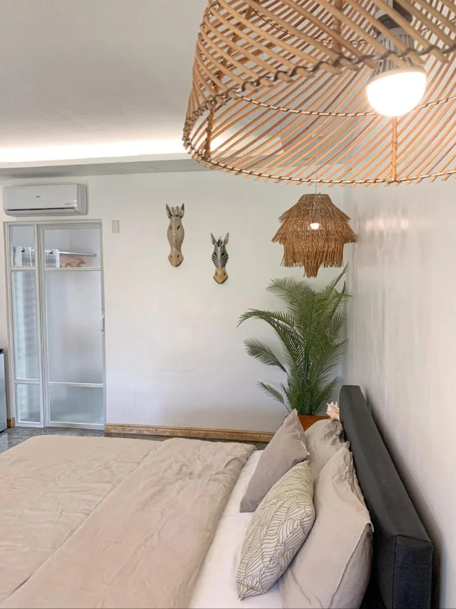 Bed in Treeshade Resort & Spa Moalboal