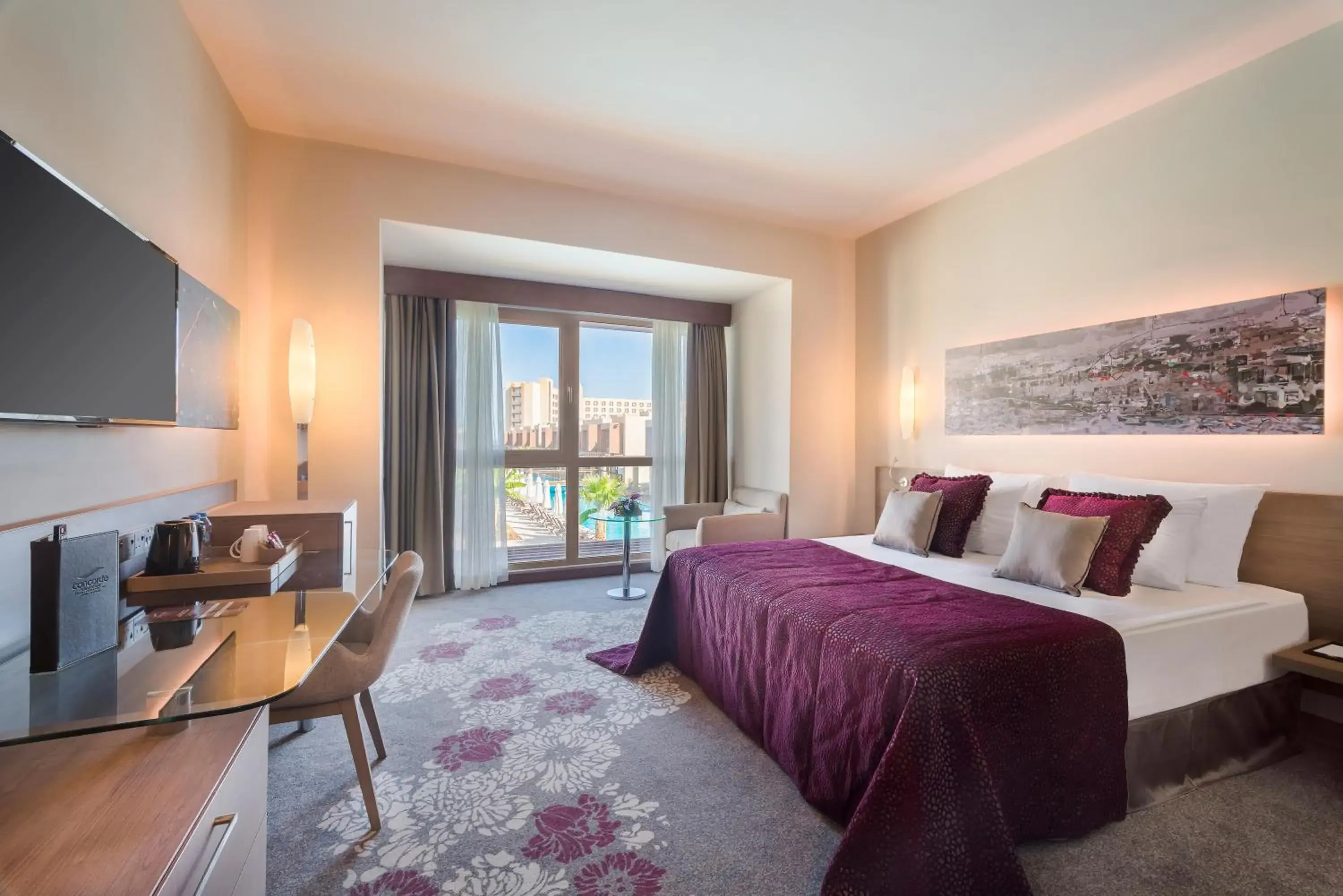 Communal lounge/ TV room, Bed in Concorde Luxury Resort & Casino Communal lounge/ TV room, Bed in Concorde Luxury Resort & Casino