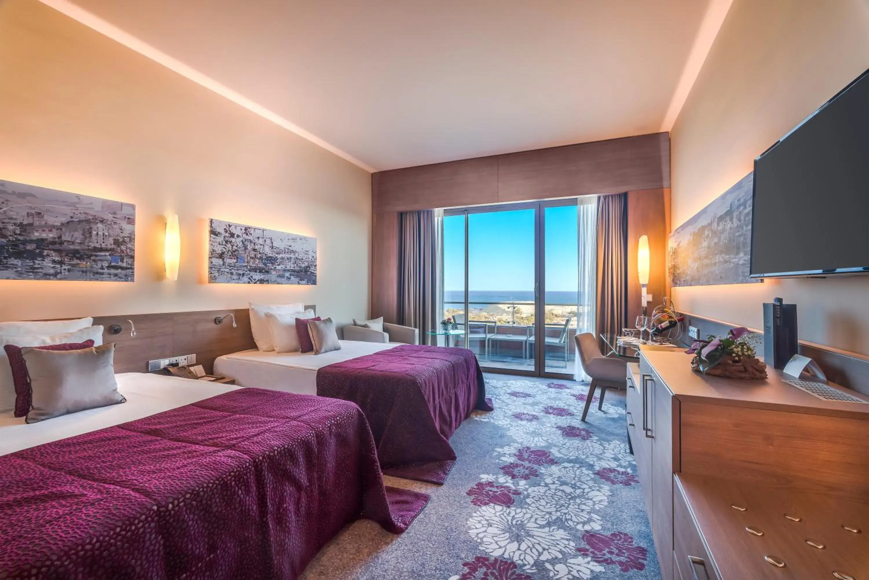 Communal lounge/ TV room, Bed in Concorde Luxury Resort & Casino Communal lounge/ TV room, Bed in Concorde Luxury Resort & Casino