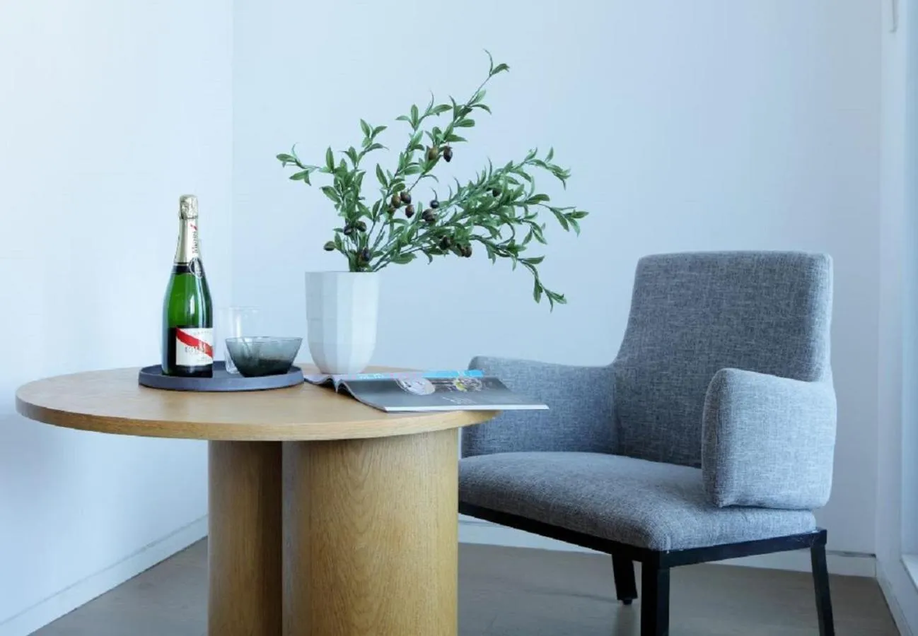 Seating area in base-PUSAN Serviced Apartment - In room Washing Machine with Dryer function & Kitchen & Free 24hrs Coffee & Close to Shanghai New International Expo Centre, Lujiazui & Subway nearby & English speaking & High speed free WiFi