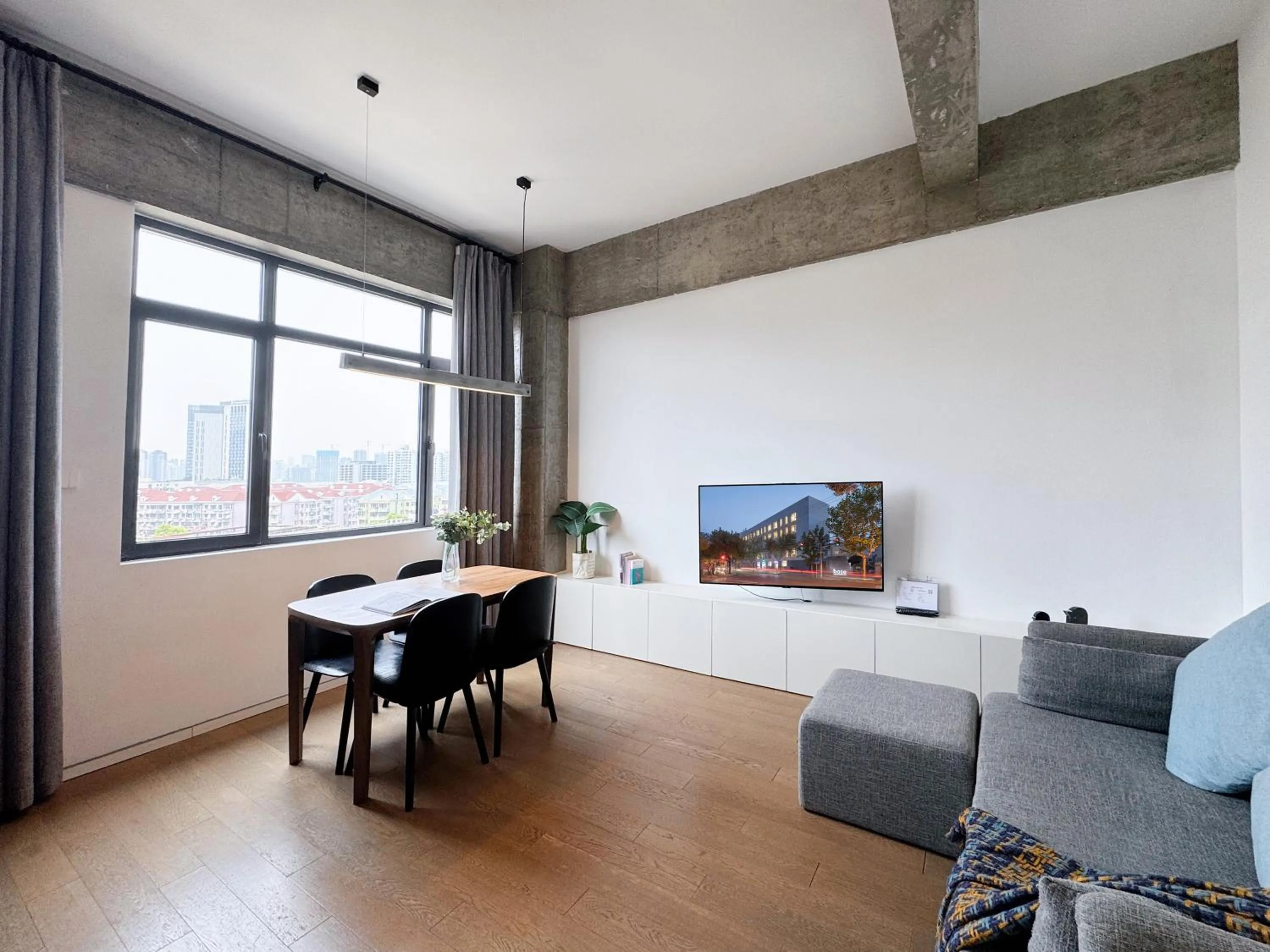 Dining area in base-PUSAN Serviced Apartment - In room Washing Machine with Dryer function & Kitchen & Free 24hrs Coffee & Close to Shanghai New International Expo Centre, Lujiazui & Subway nearby & English speaking & High speed free WiFi