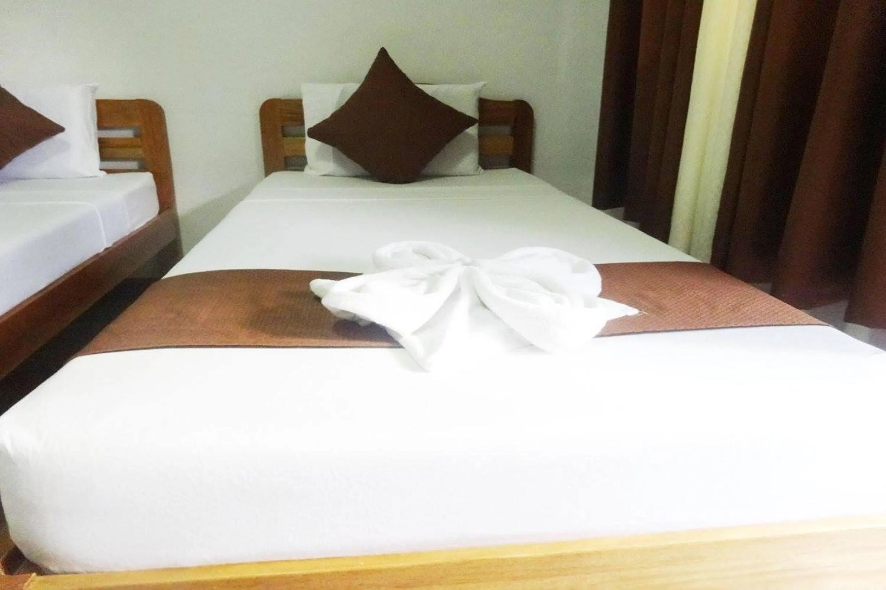 Bed in Tenzai Homestay