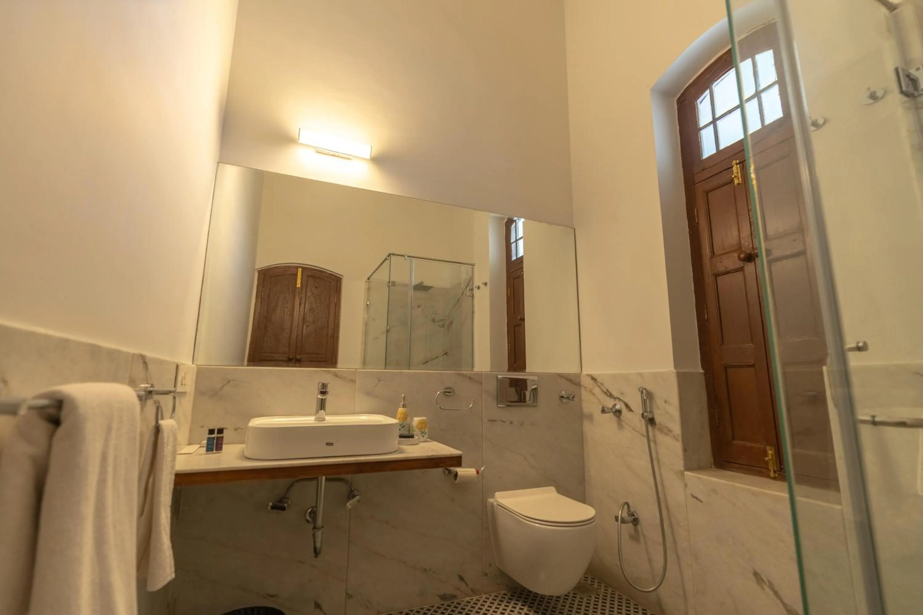 Bathroom in DanCenter by CheckIn House of Jasol Jaipur