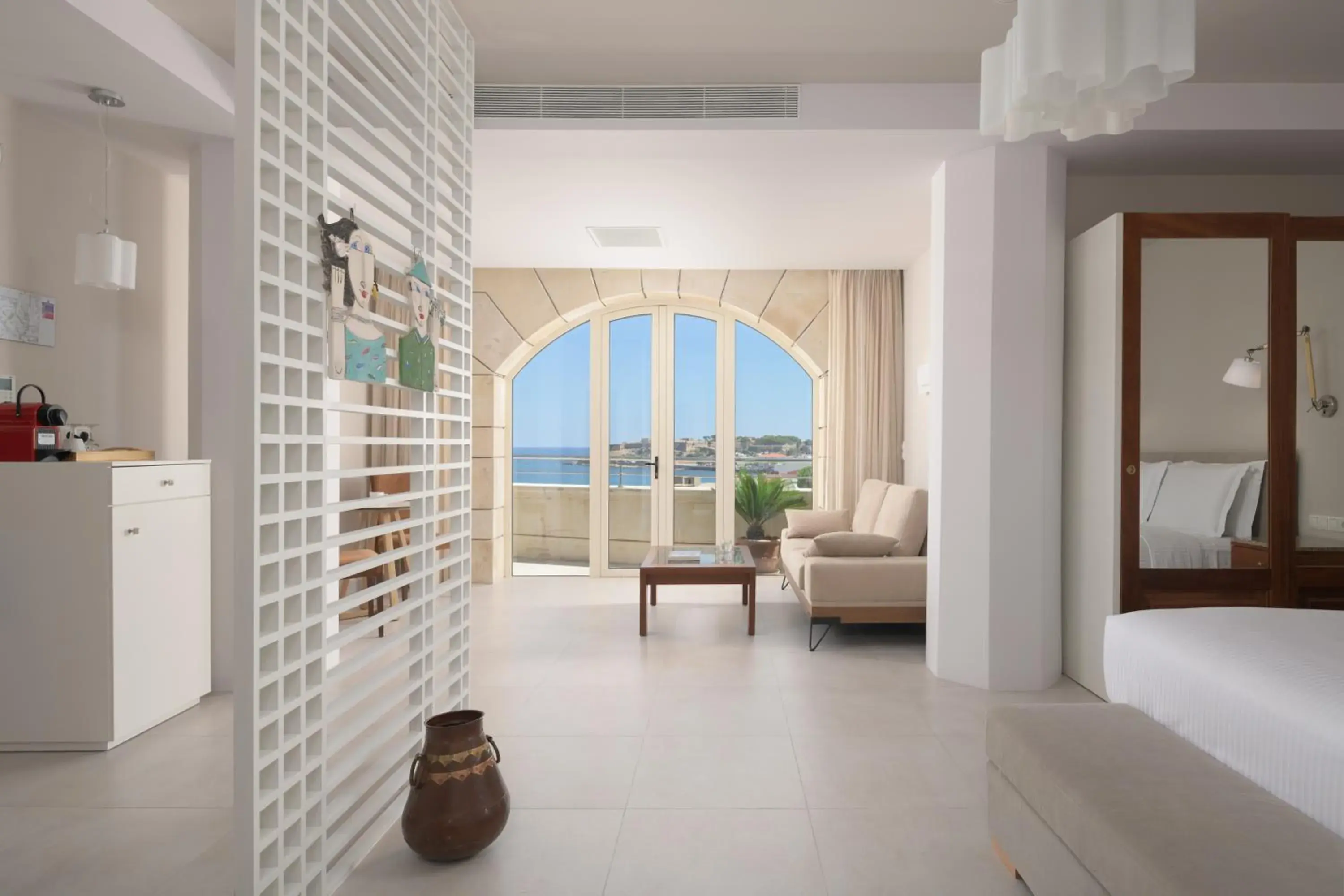 Seating area, Bed in Macaris Suites & Spa Seating area, Bed in Macaris Suites & Spa