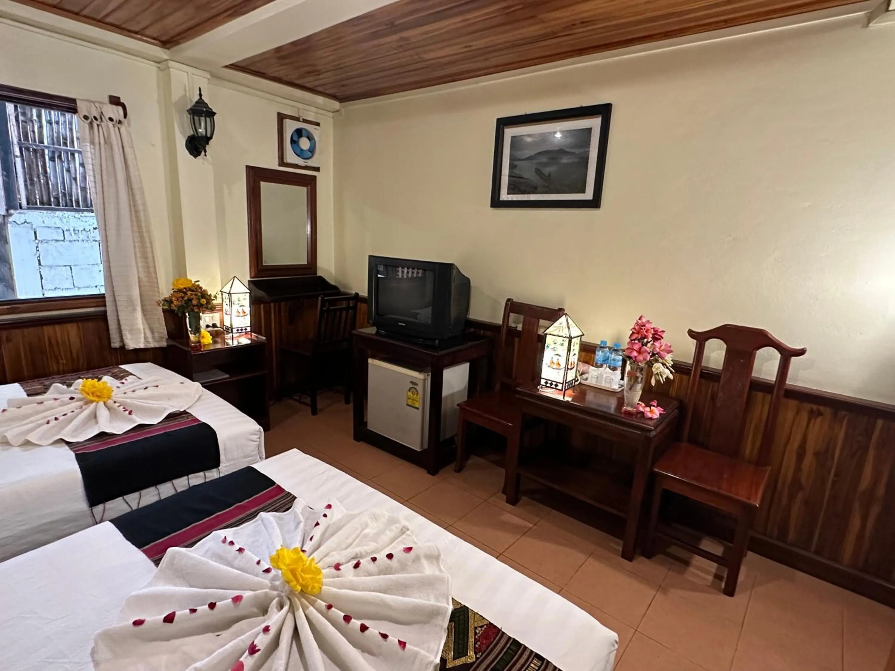 Bed in Villa Alounsavath Mekong Riverside