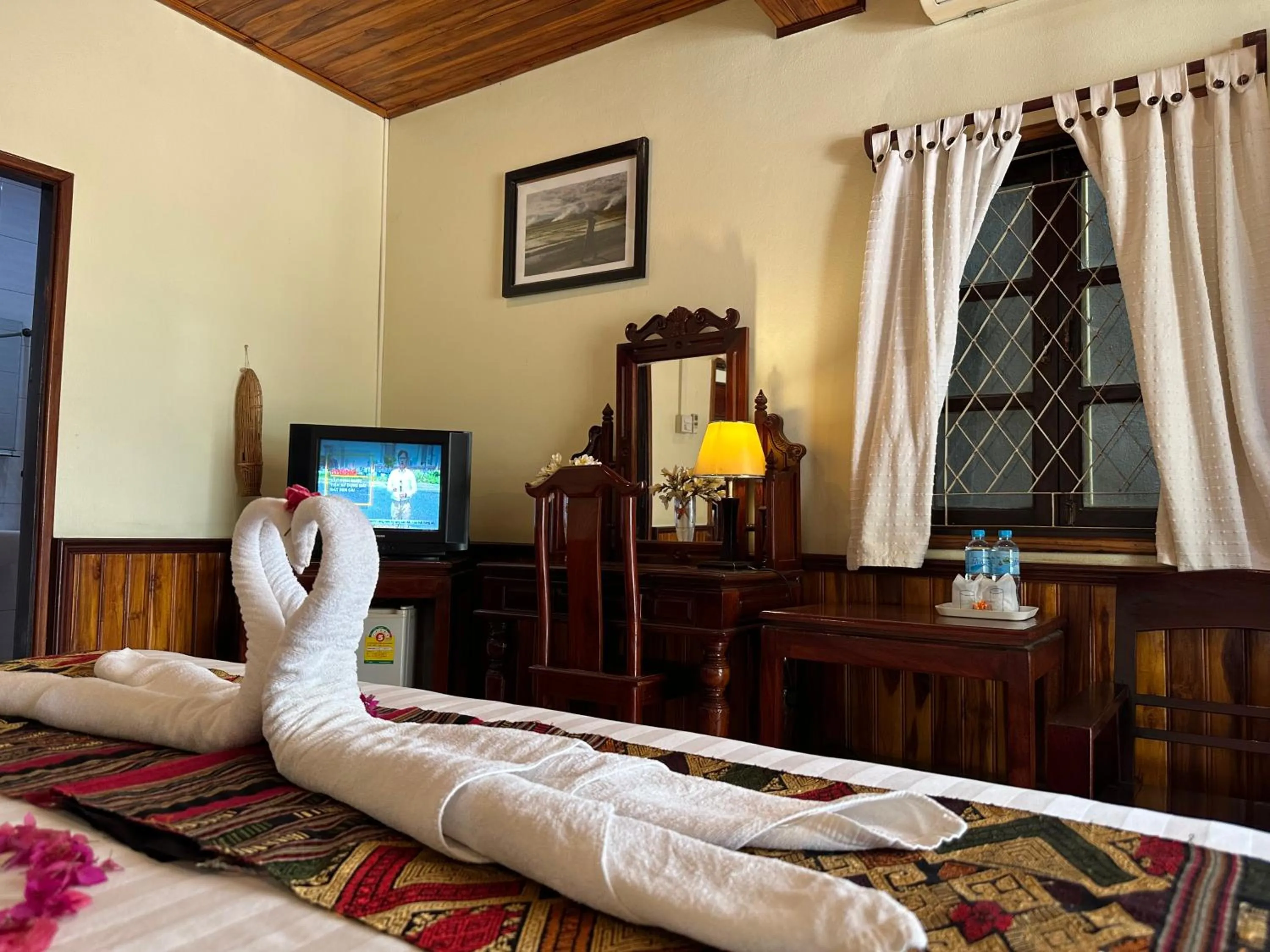 Bed in Villa Alounsavath Mekong Riverside