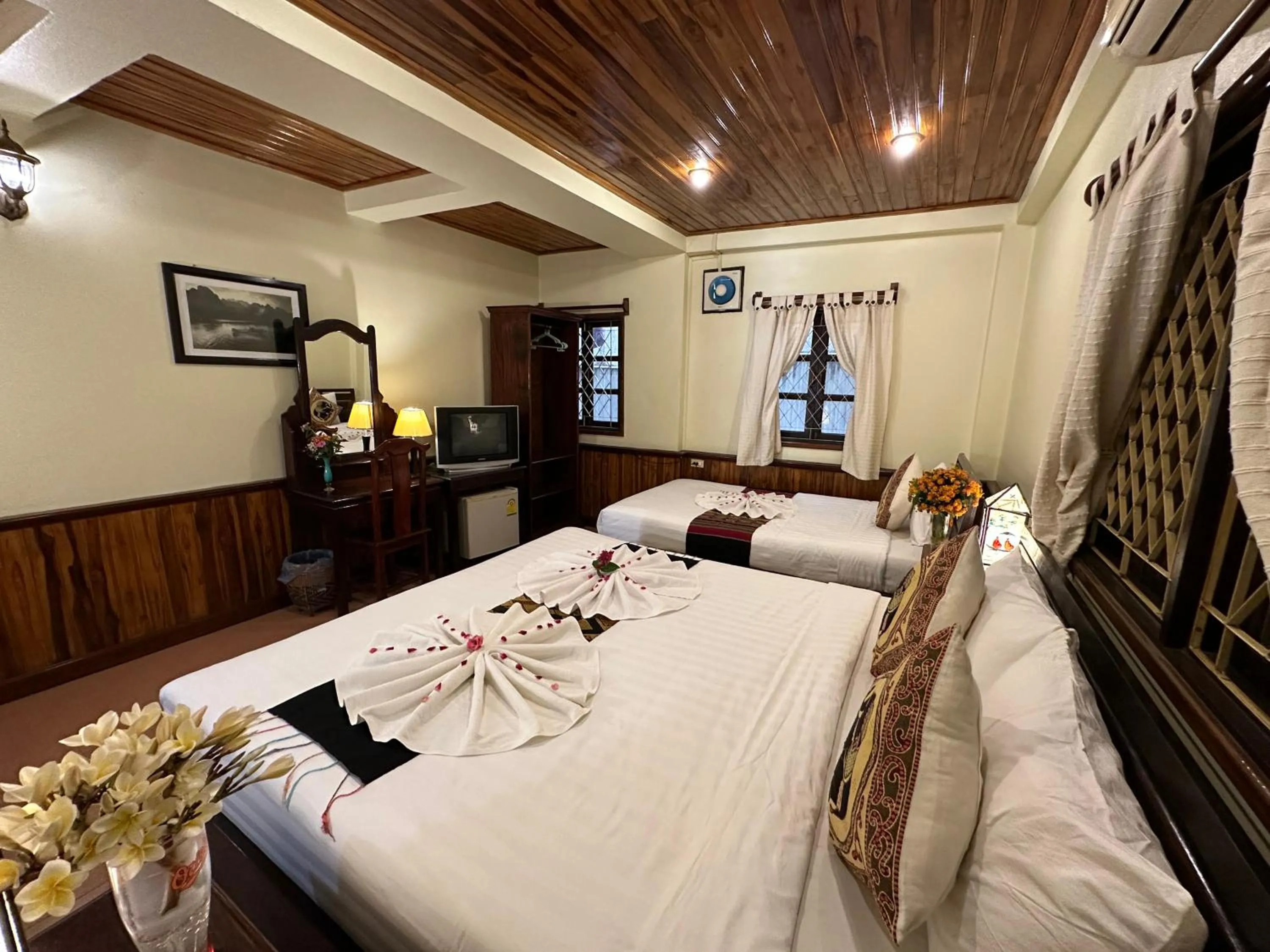 Bed in Villa Alounsavath Mekong Riverside