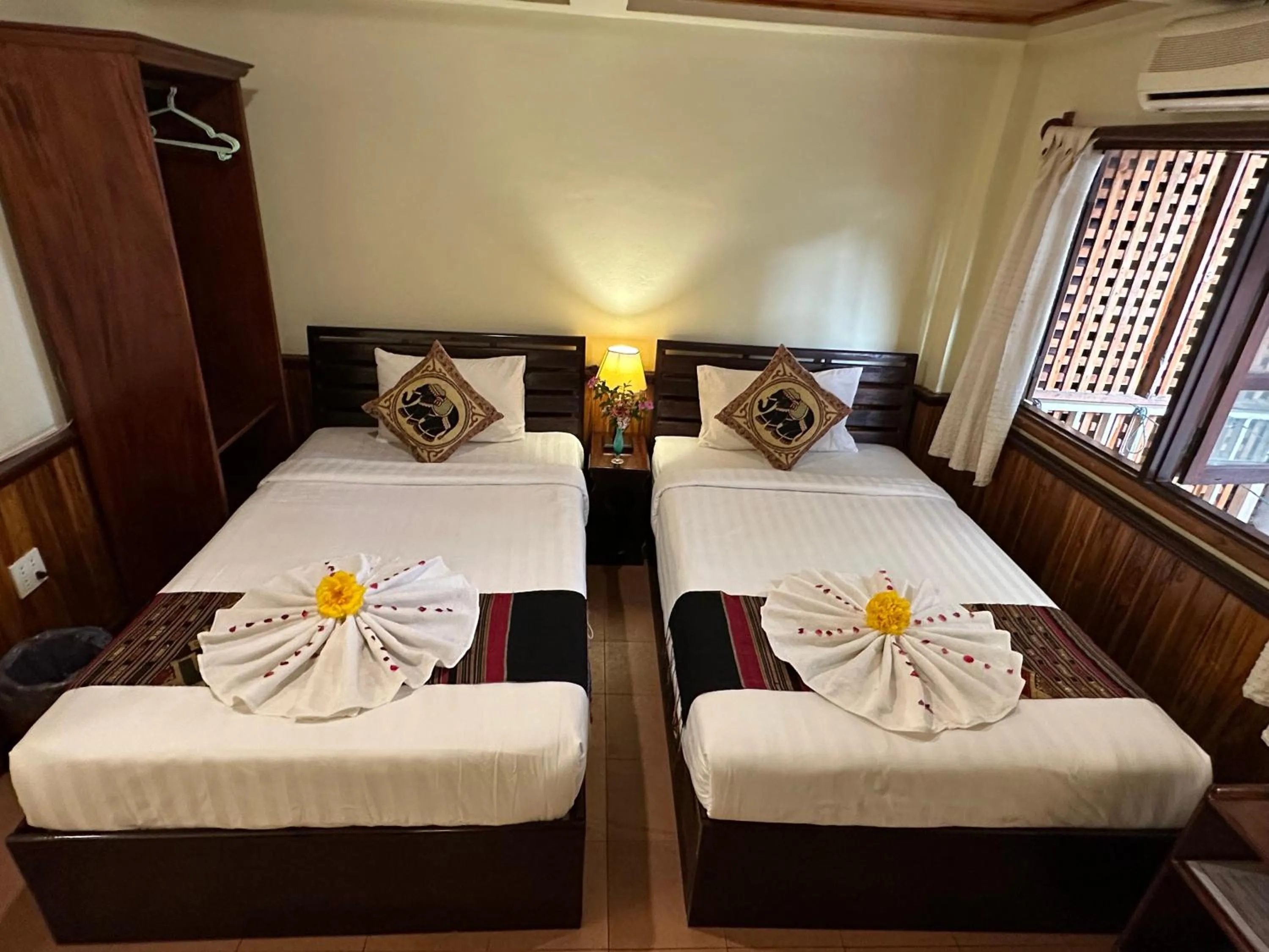 Bed in Villa Alounsavath Mekong Riverside