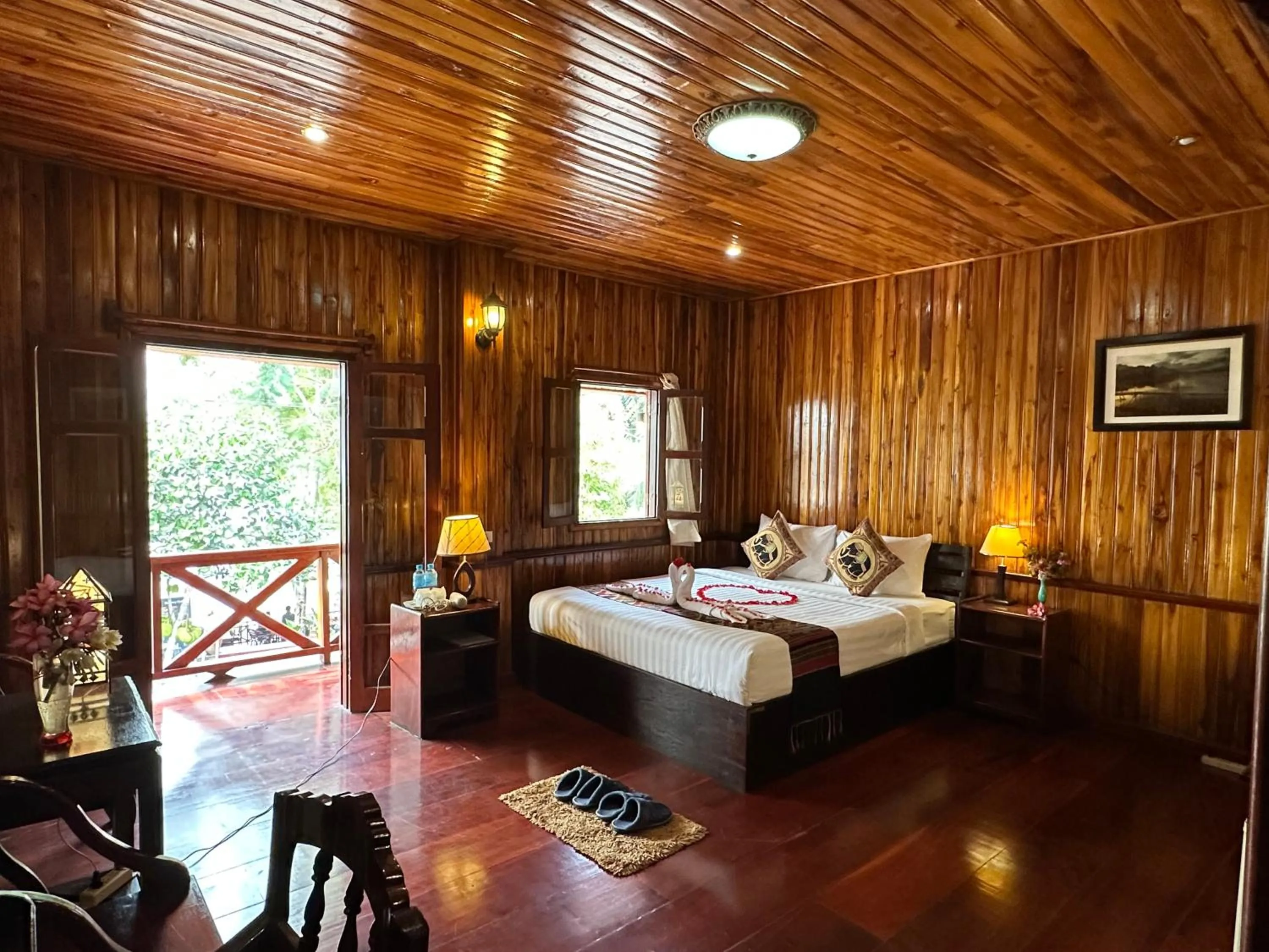 Bed in Villa Alounsavath Mekong Riverside