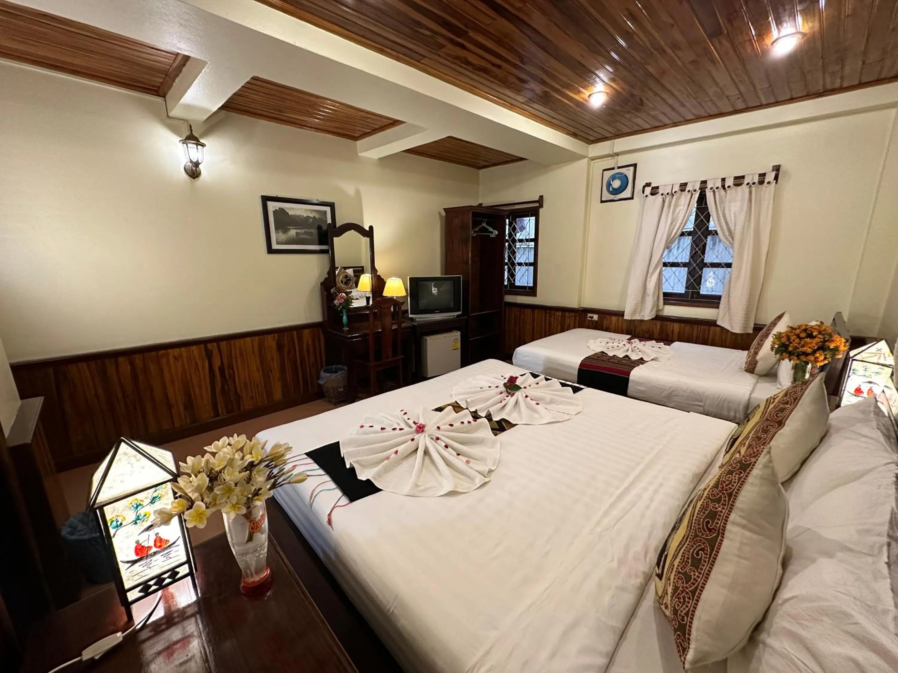 Bed in Villa Alounsavath Mekong Riverside