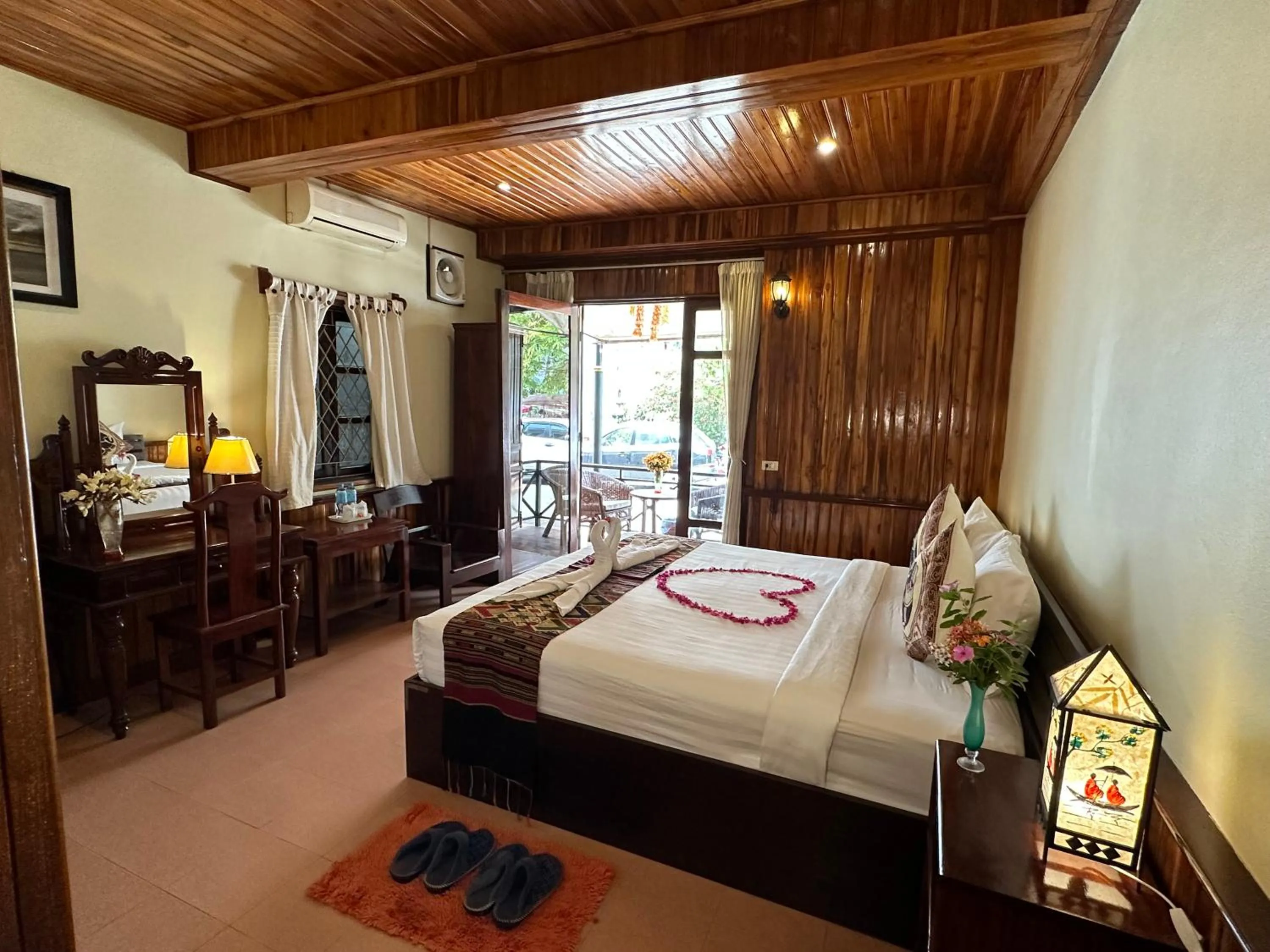 Living room, Bed in Villa Alounsavath Mekong Riverside