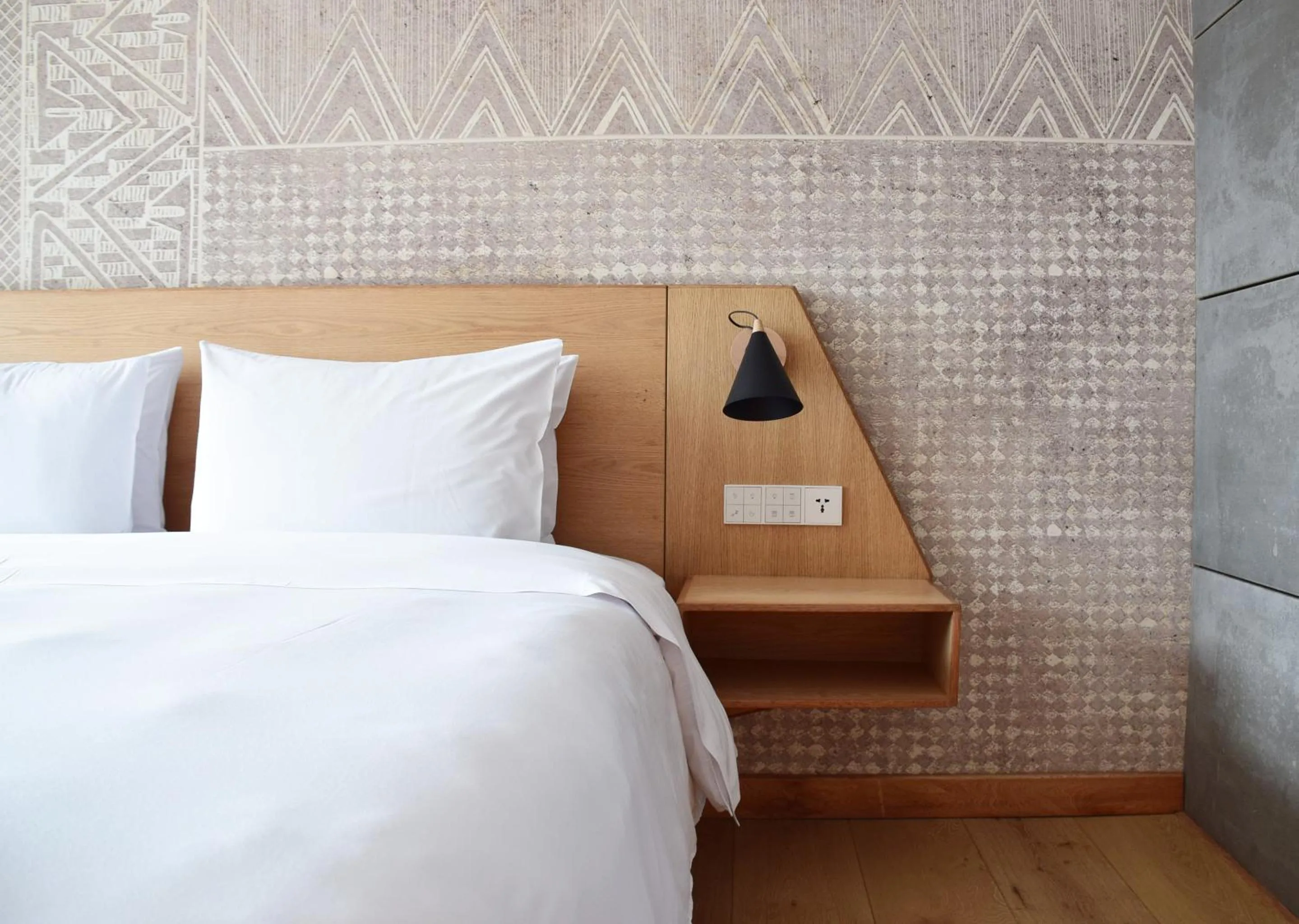 Bed in GO Quito Hotel