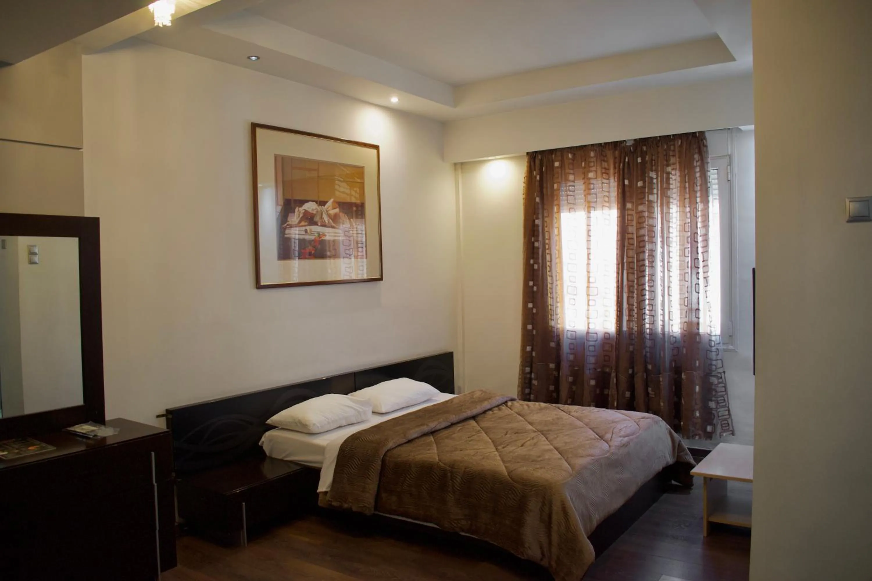 Bed in Minoa Athens Hotel